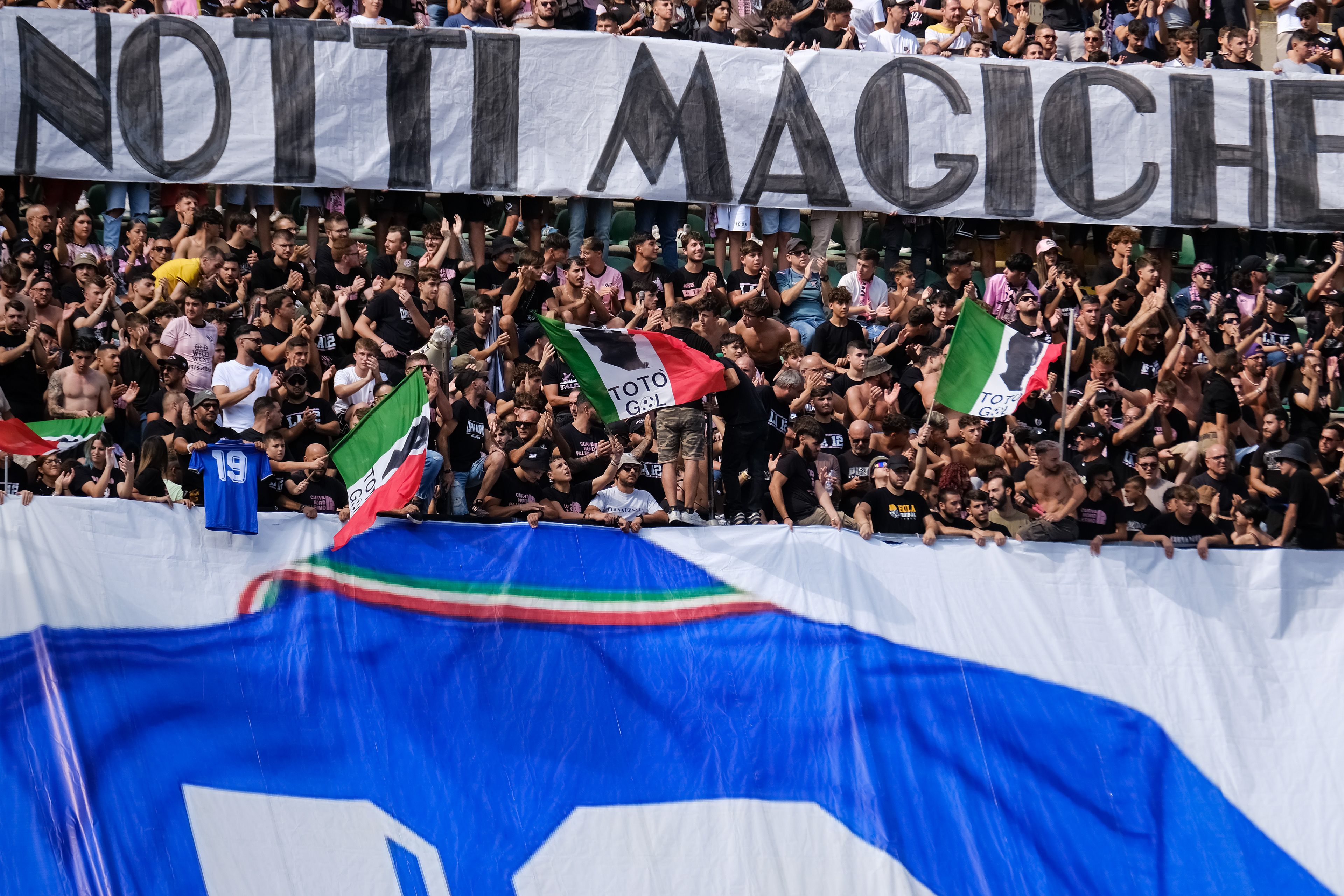 PALERMO v CESENA - Serie B // PALERMO, ITALY - SEPTEMBER 29: Palermo FC's supporters showing a banner in memory of Salvatore Schillaci during the Serie B match between Palermo FC and Cesena at Stadio Comunale Renzo Barbera on september 29, 2024 in Palermo, Italy. (Photo by Federico Serra)