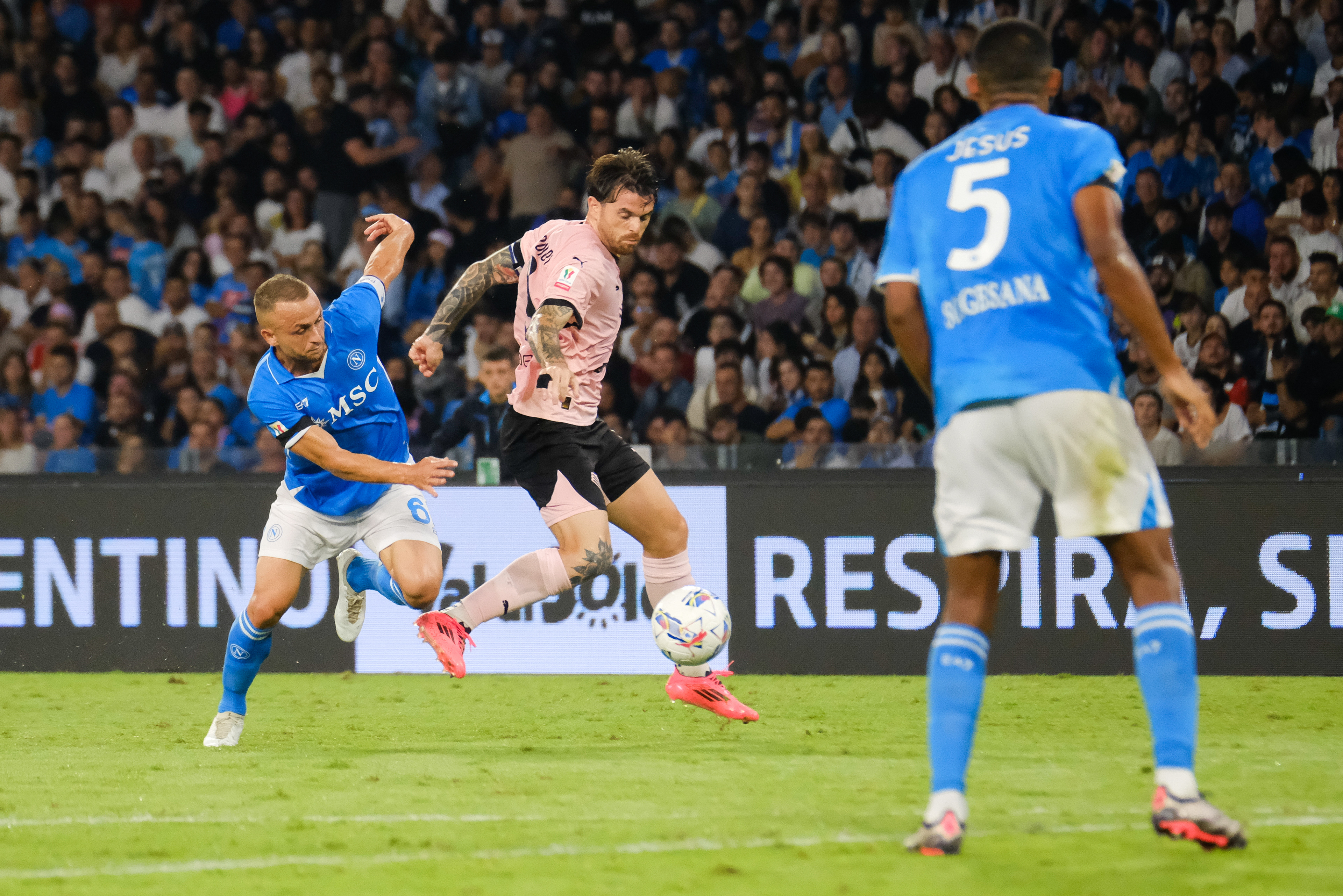NAPOLI v PALERMO - Coppa Italia // NAPOLI, ITALY - SEPTEMBER 26: Matteo Brunori (C) of Palermo FC, Stanislav Lobotka (L) of SSC Napoli and Juan Jesus (R) of SSC Napoli on action during the Coppa Italia match between SSC Napoli and Palermo FC at Stadio Diego Armando Maradona on september 26, 2024 in Napoli, Italy. (Photo by Federico Serra)