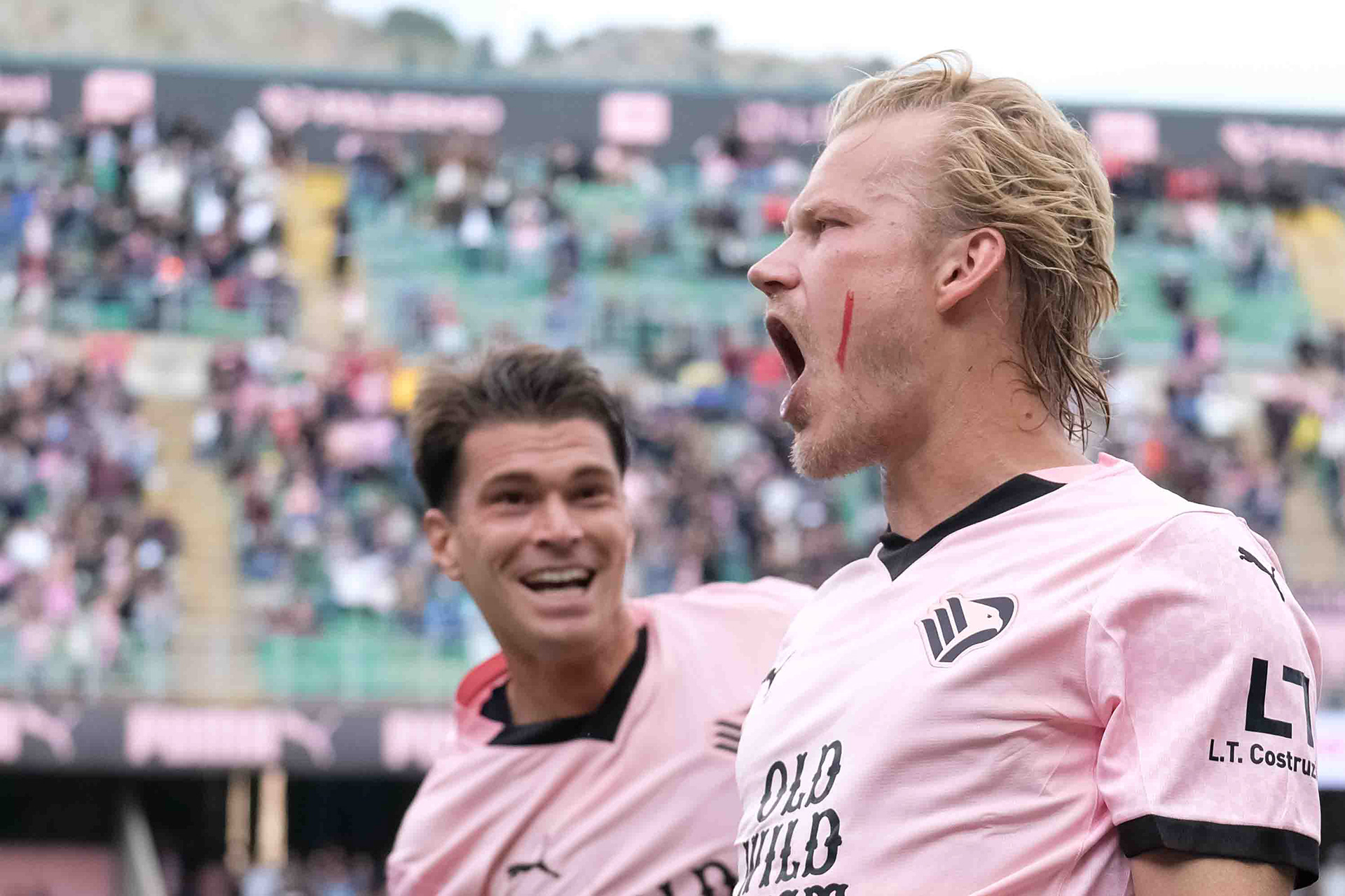 PALERMO v SASSUOLO - Serie B // PALERMO, ITALY - APRIL 06: Joel Pojanpalo (R) of Palermo FC and Jacopo Segre (L) of Palermo FC celebrate lead goal (1-0), during the Serie B match between Palermo FC and Sassuolo at Stadio Comunale Renzo Barbera on april 26, 2025 in Palermo, Italy. (Photo by Federico Serra)