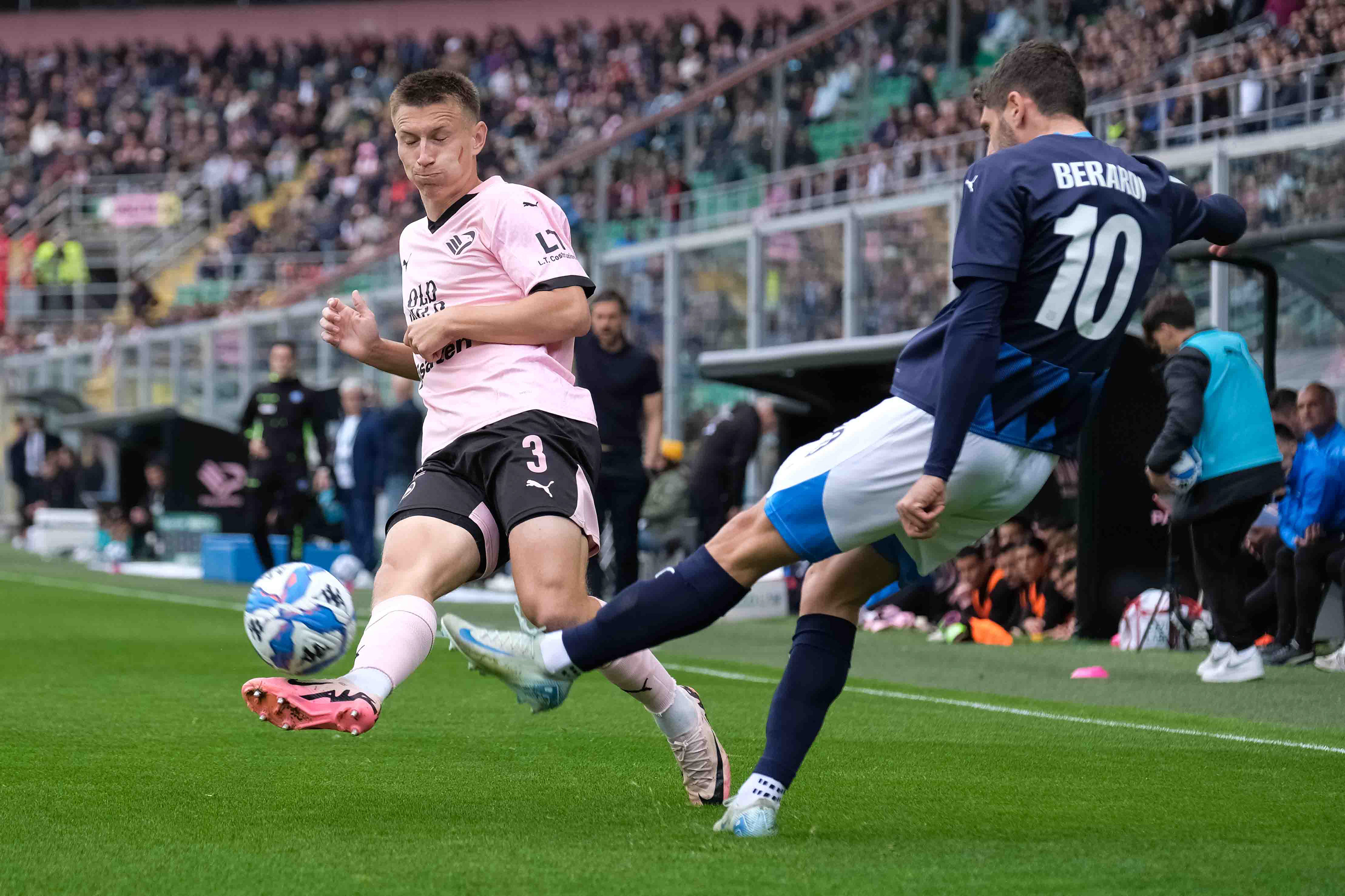 PALERMO v SASSUOLO - Serie B // PALERMO, ITALY - APRIL 06: Kristoffer Lund Hansen (L) of Palermo FC and Domenico Berardi (R) of Sassuolo in action during the Serie B match between Palermo FC and Sassuolo at Stadio Comunale Renzo Barbera on april 06, 2025 in Palermo, Italy. (Photo by Federico Serra)