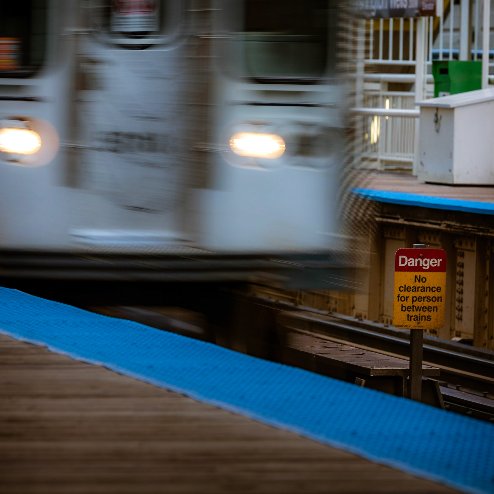 Mind The Blue Line || A thick, rubberized blue treading denotes the platform edges of this Chicago CTA station. While a pleasant surprise, I never associated blue as a warning color.