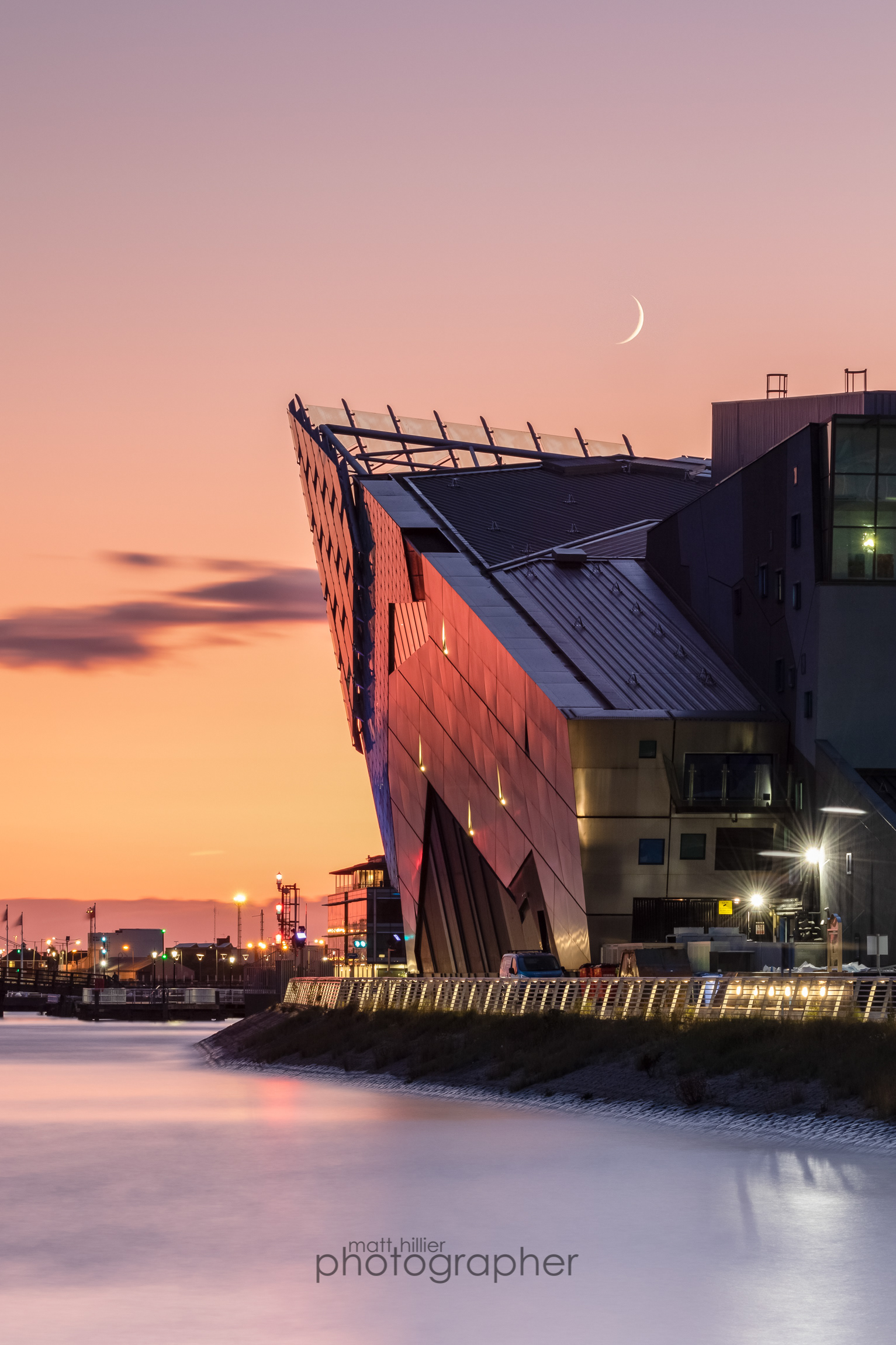 A Crescent Moon Setting Into the Deep