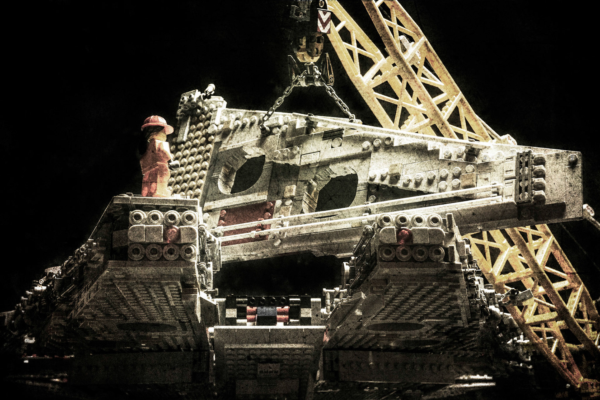 Historical photos of installing the top right mandible panels of the Millennium Falcon.