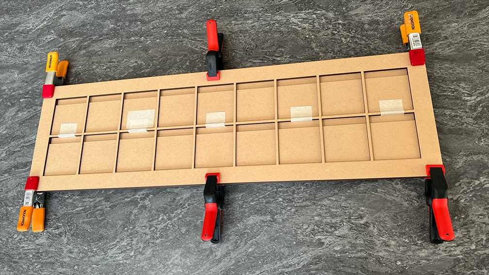 Layered parts prior to decorating (letters face).