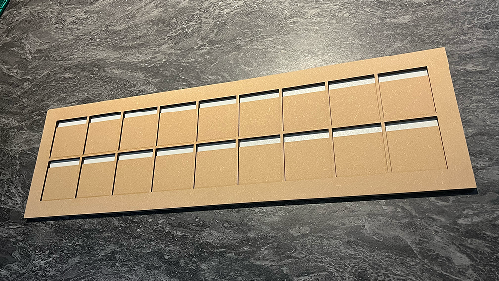 Primed middle piece (letters face).