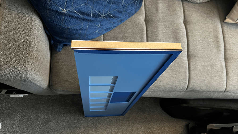 Lining the leather along the side face.