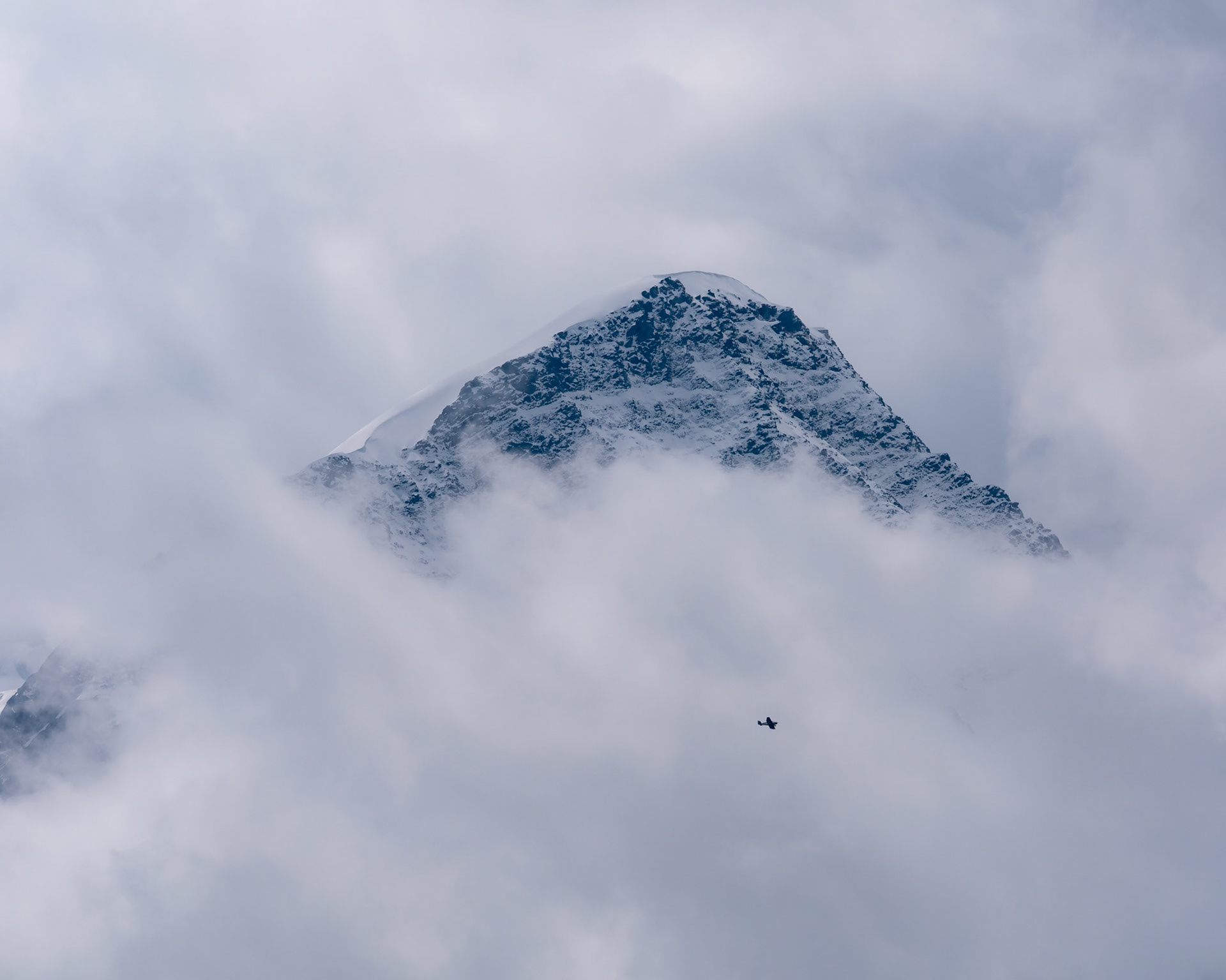 I took this picture in front of the Mont-Blanc, above Chamonix, while hiking. I was enjoying a break in front of the mountains, admiring the clouds dancing around the tops, when I spotted a small plane taking off. I am especially attracted by landscapes where you can feel the power of nature compared to the smallness of us humans, and this is what I felt with this tiny fragile plane in front of this massive giant.