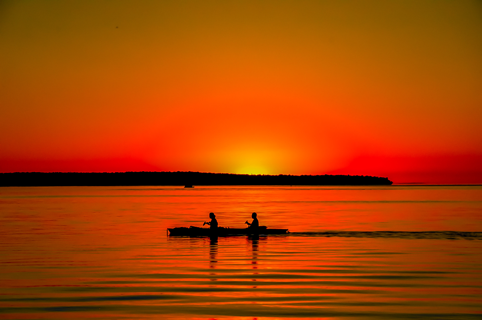 Kayakers at sunset; Munising. July 2018