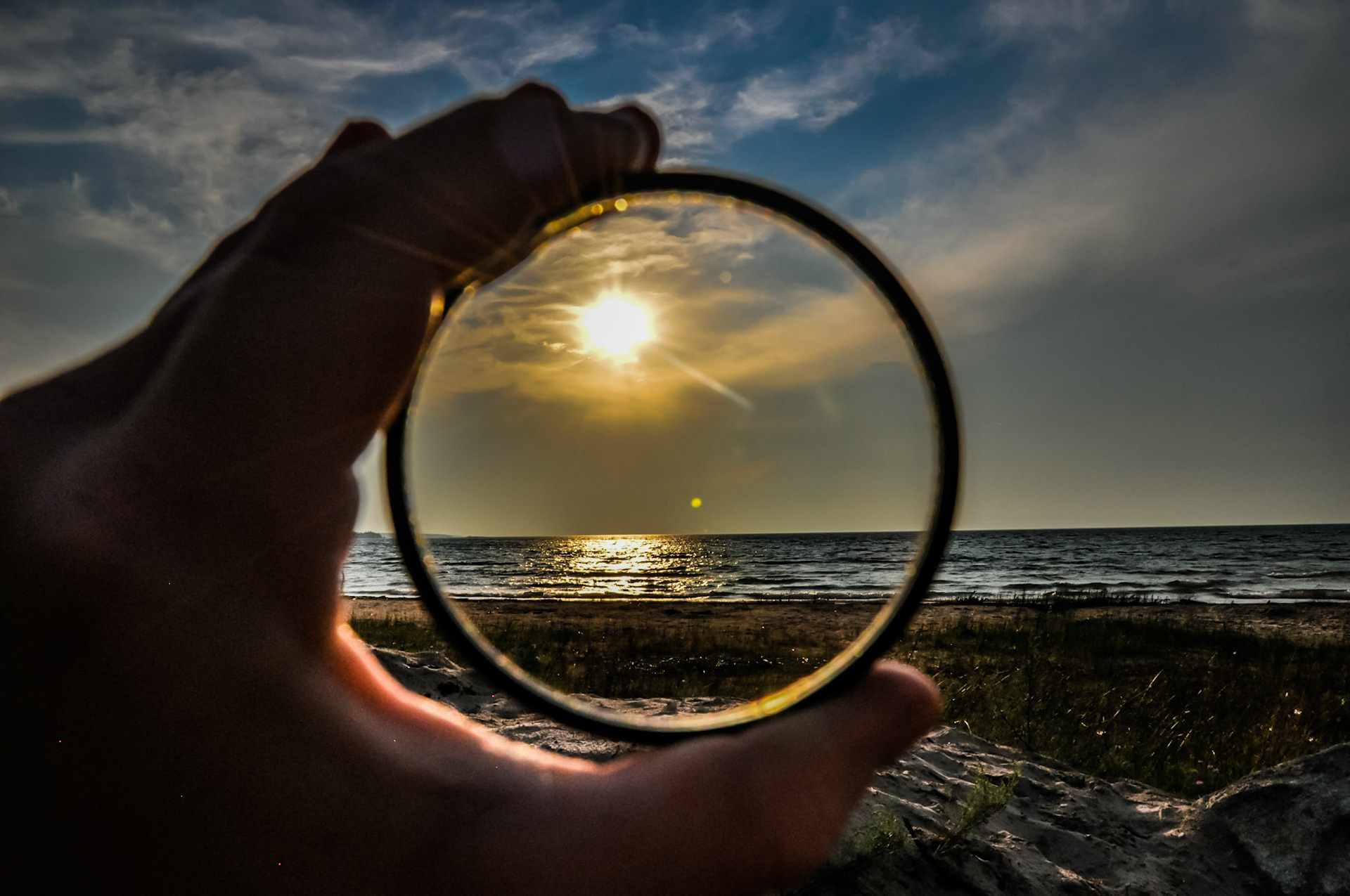 The beach through my detached lens filter. Somtimes framing is KEY!