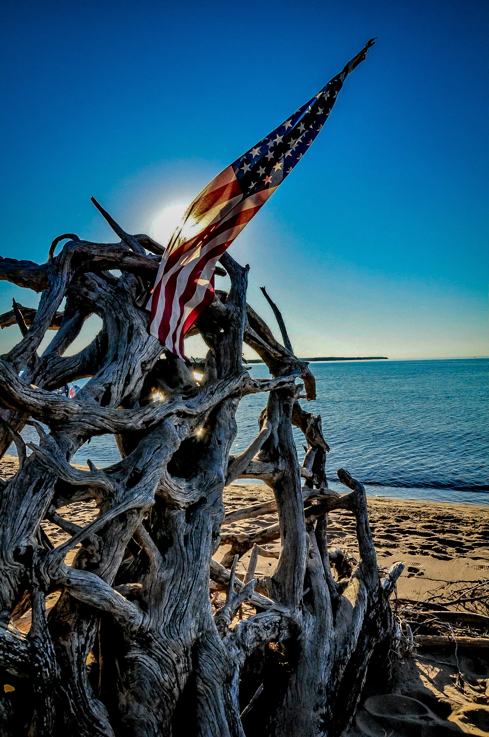 American Flag on a campground beach; Munising. July 2018