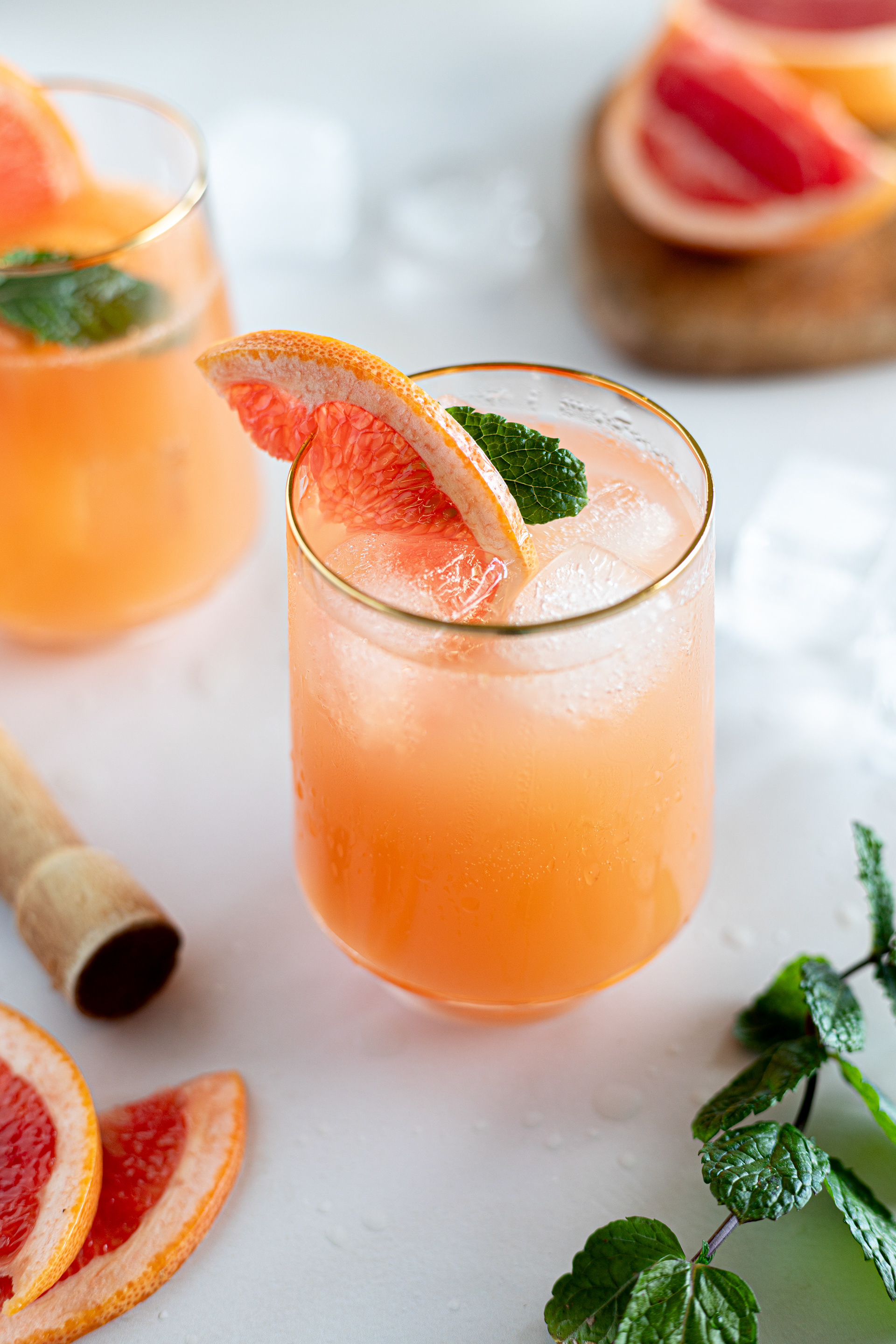Paloma cocktail with fresh mint and grapefruit, beverage photography