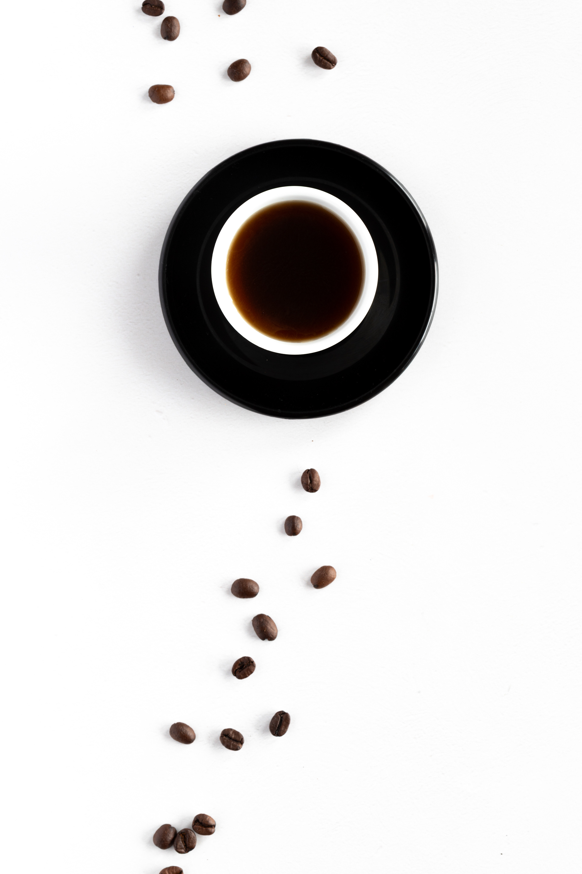 Coffee beans and espresso cup