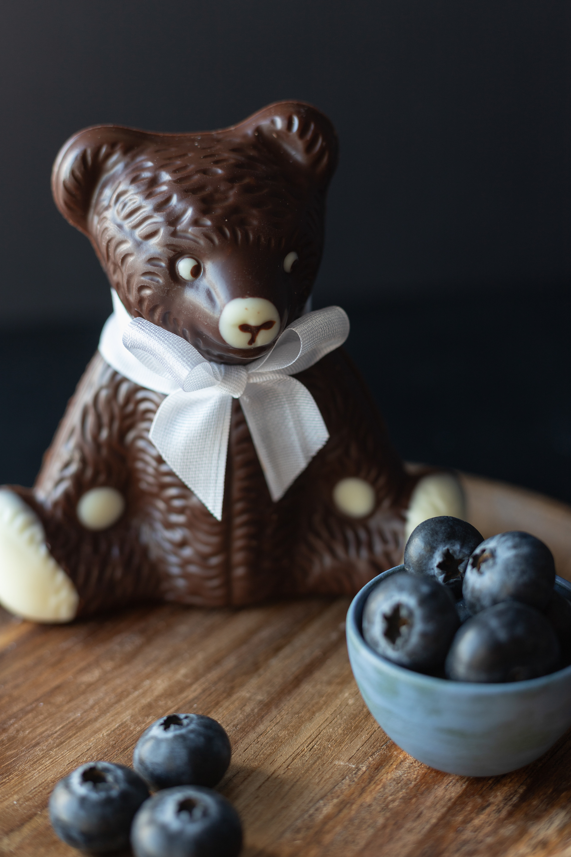 Dark chocolate bear and blueberries bowl, food photography, captured by Hungry Kamera, food photographer, available in Glasgow and worldwide