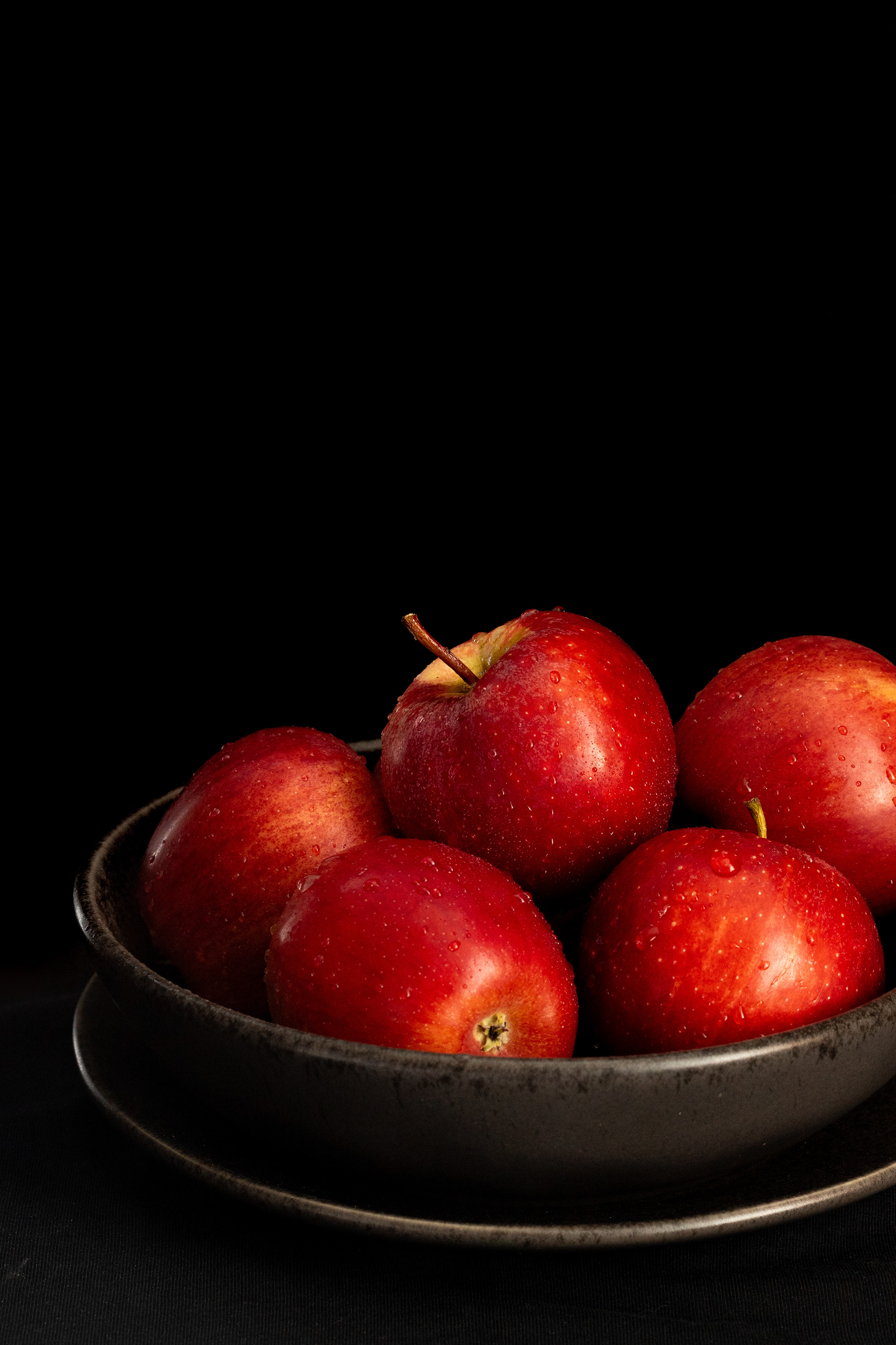 Apples in a dark background, food photography