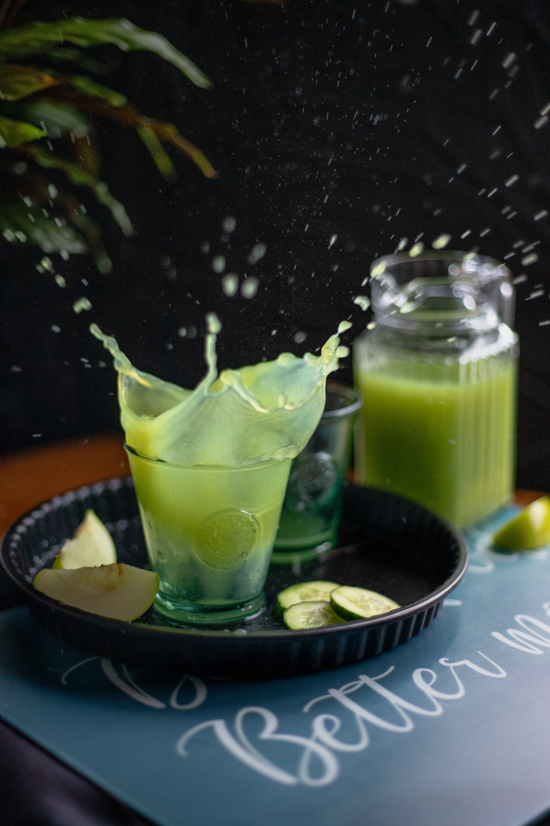 Kiwi, cucumber, apple and matcha smoothie splash, beverage photography