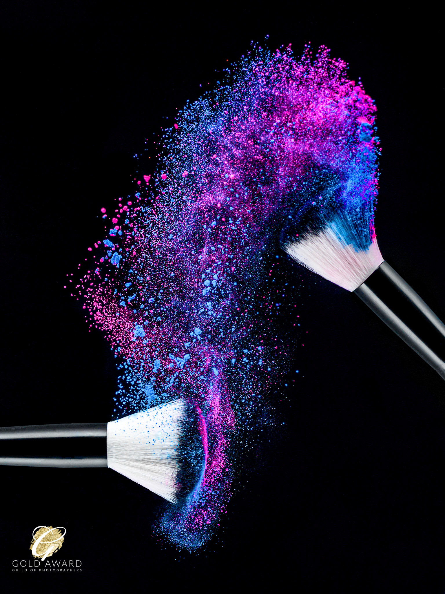 Moment in time image of powder swept across brushes