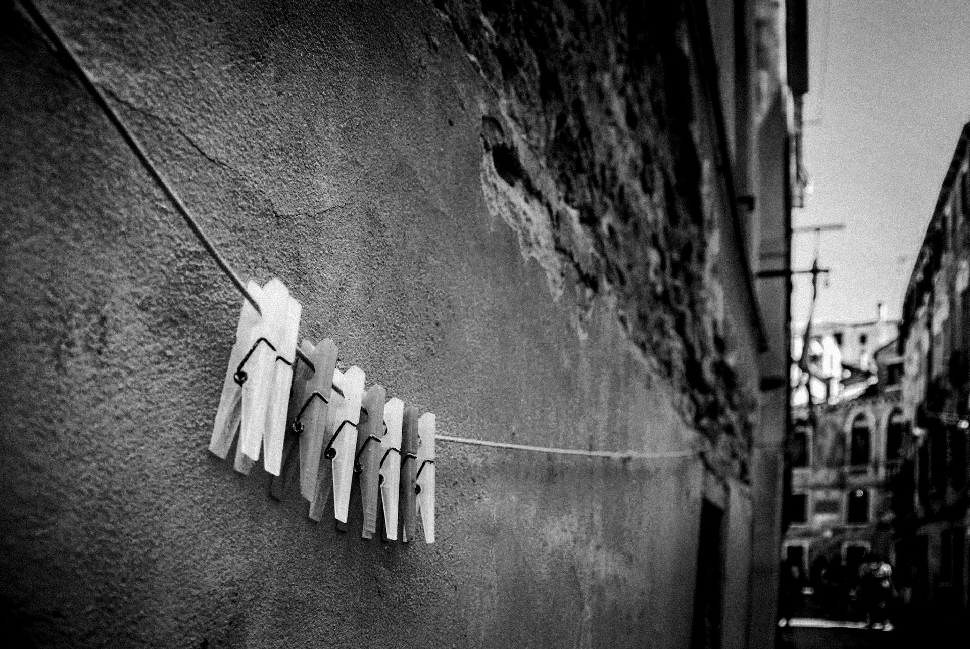 Clothes pegs hanging on a washing line
