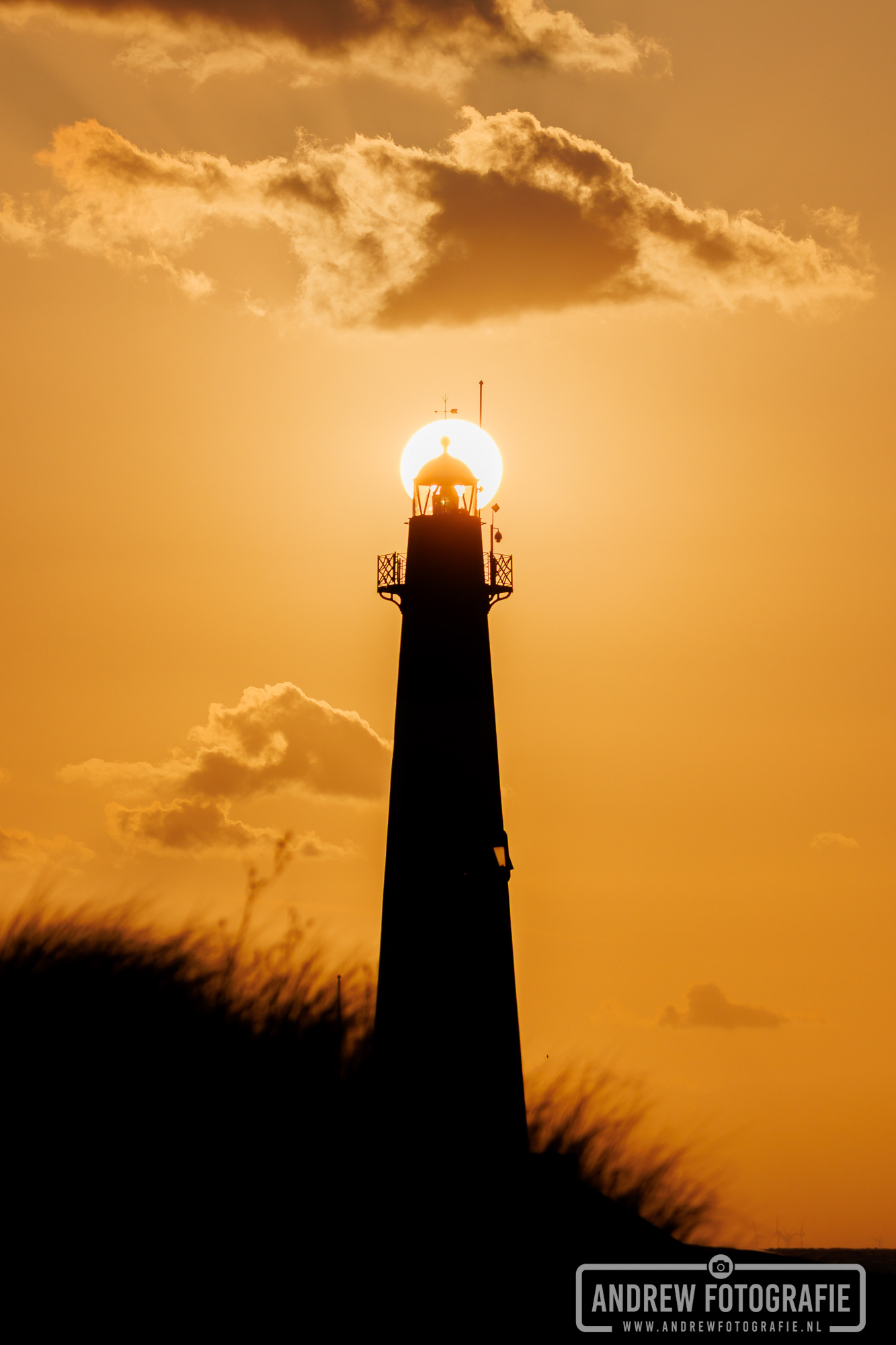 Vuurtoren 'Nieuwe Sluis' in Breskens bij zonsondergang – Bekroonde foto (Top 3% Photocrowd)