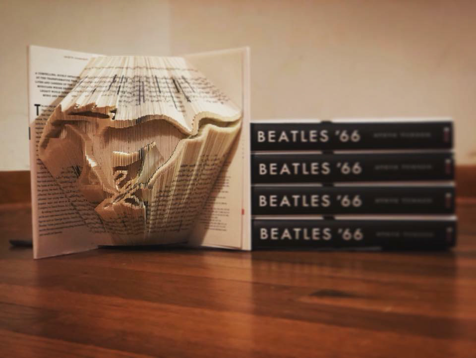 Five mustangs folded into five matching books, picked out by the client.