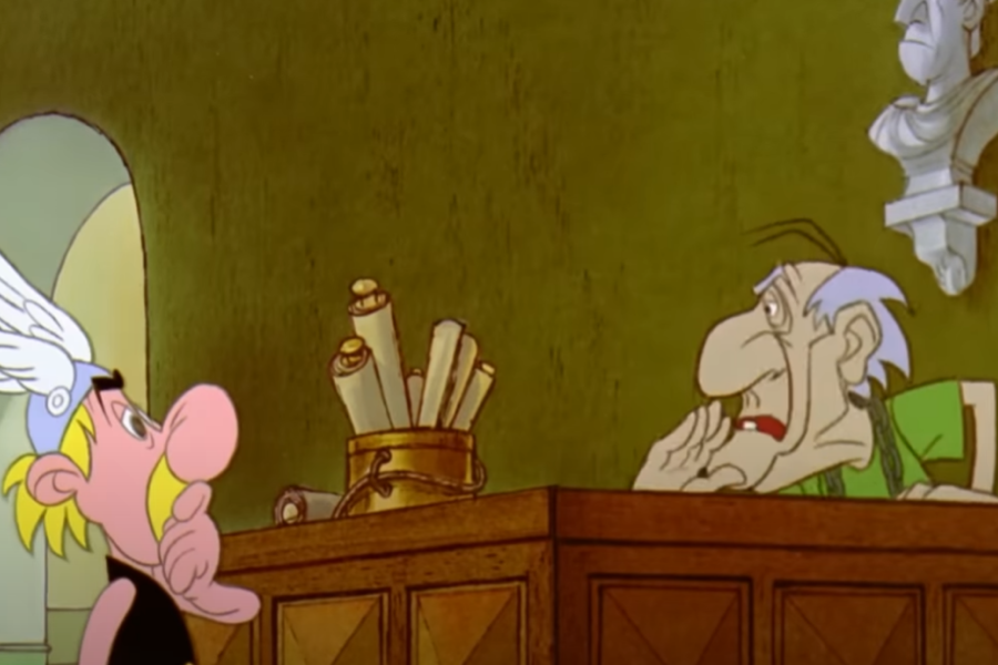 Asterix spricht laut mit einem schwerhörigen Pförtner in der Eingangshalle des 'Hauses, das Verrückte macht' aus 'Asterix erobert Rom'