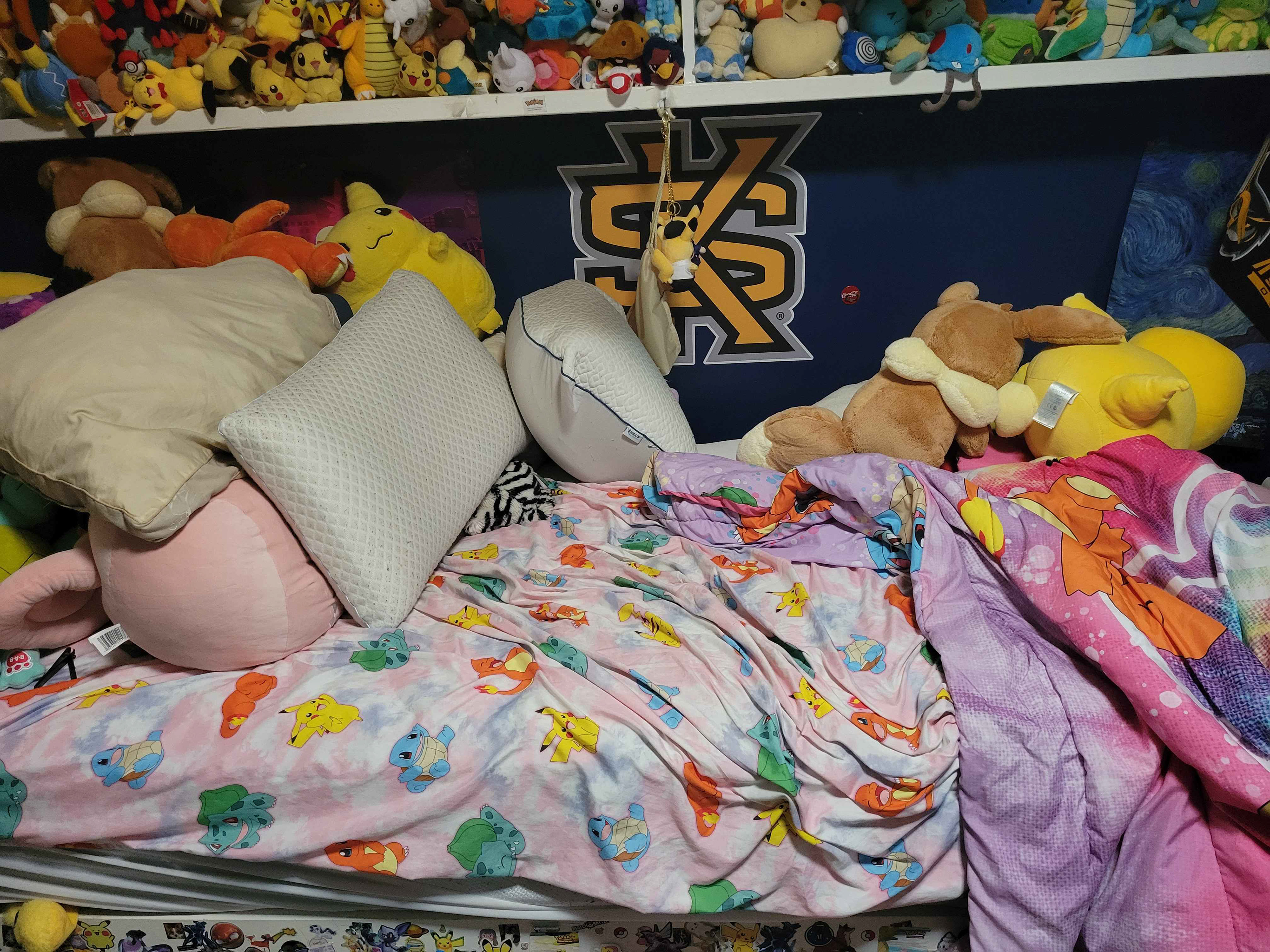 I messed my bed up a bit to make it look more like someone is inside of it. I definitely make my bed on a regular basis (I don't). As you can tell, I am very normal about Pokémon.