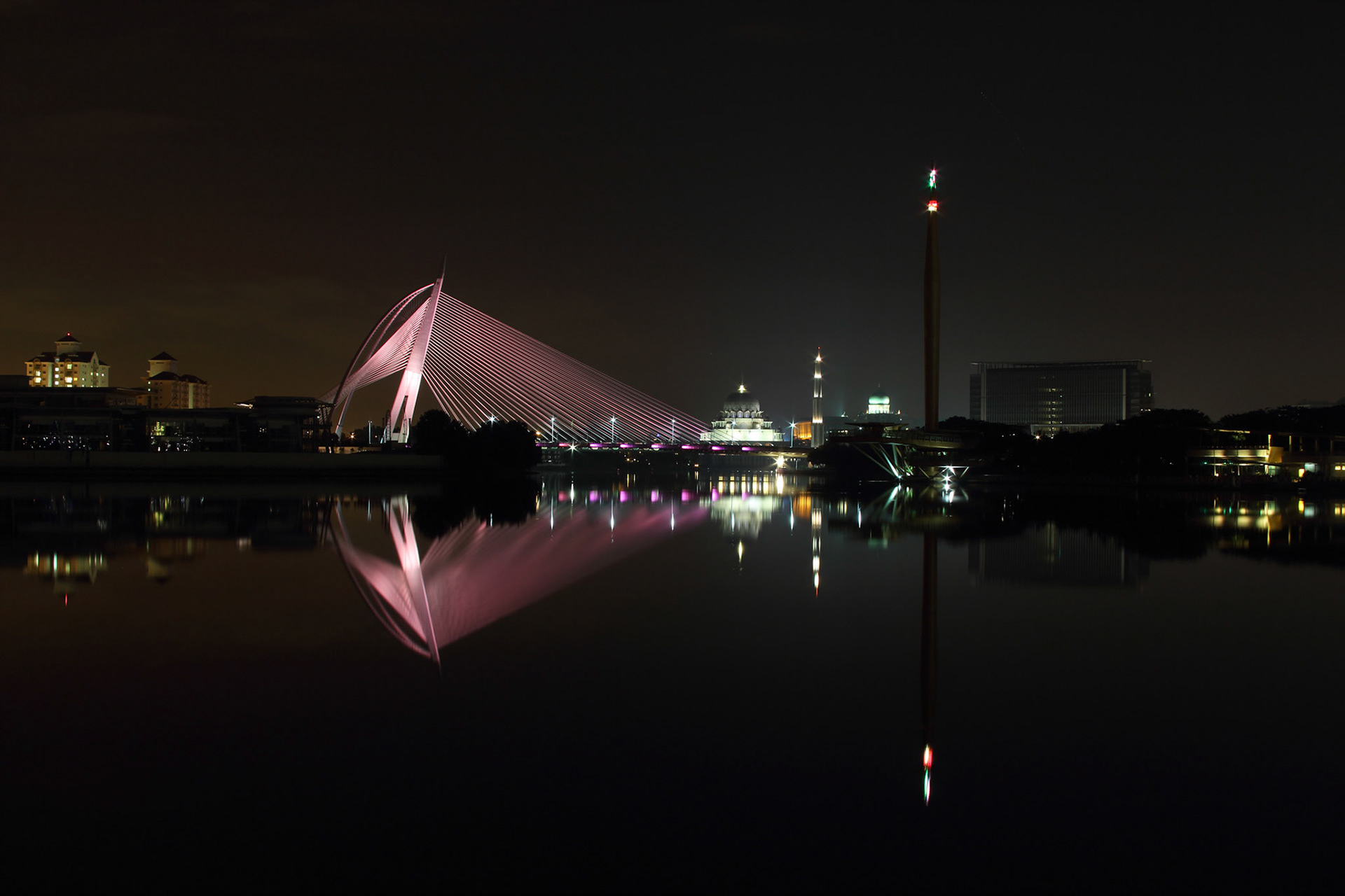 The Seri Wawasan Bridge Putrajaya at night with its reflection on the lake water