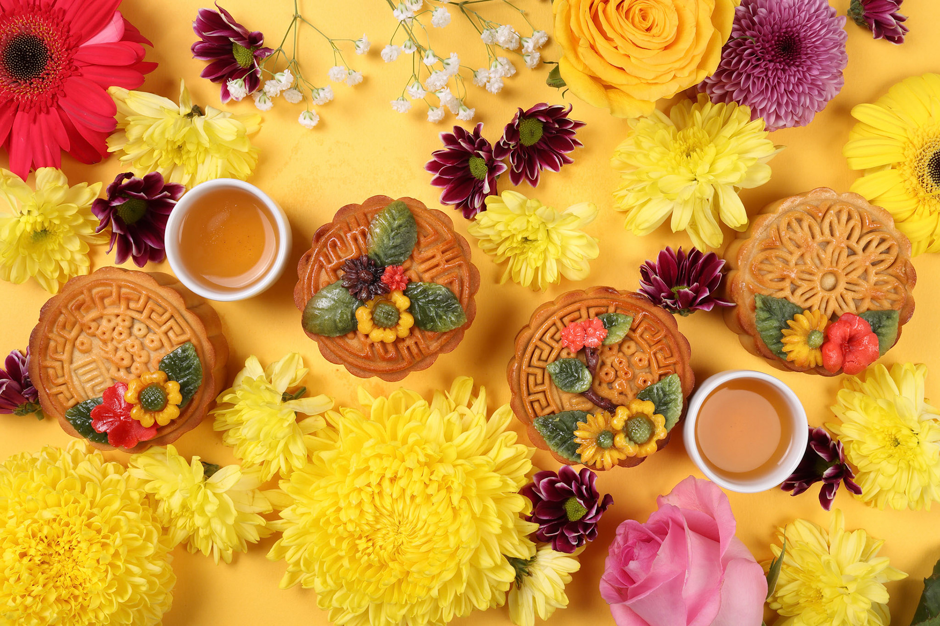 Colorful flower decorated moon cake Chinese mid autumn festival daisy chrysanthemum mum rose baby breath flower red yellow pink purple violet on yellow background