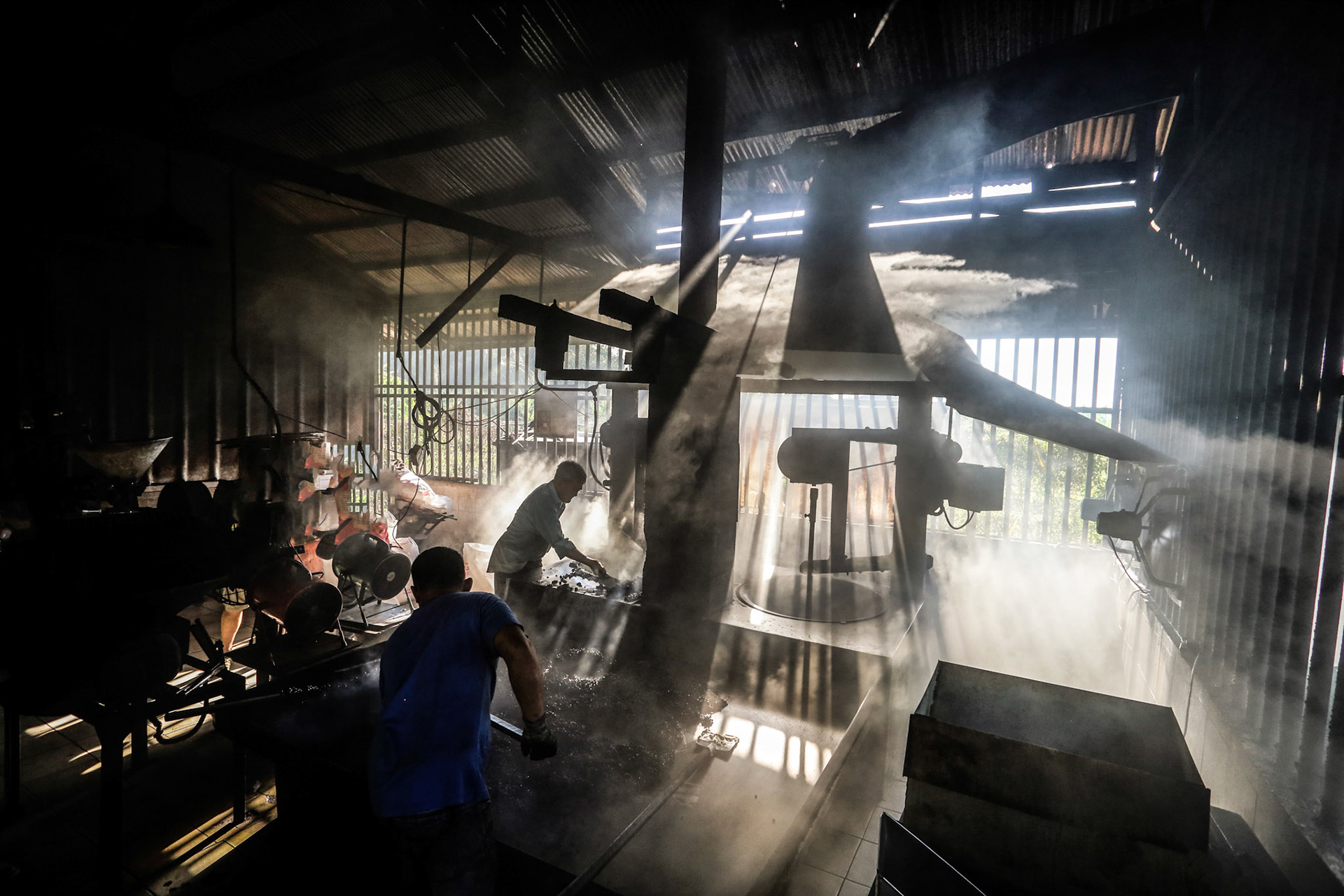 Malaysia, Kelang-March 14, 2020 – Old fashioned coffee factory full of smoke and aroma of roasted coffee still favorite among local consumers