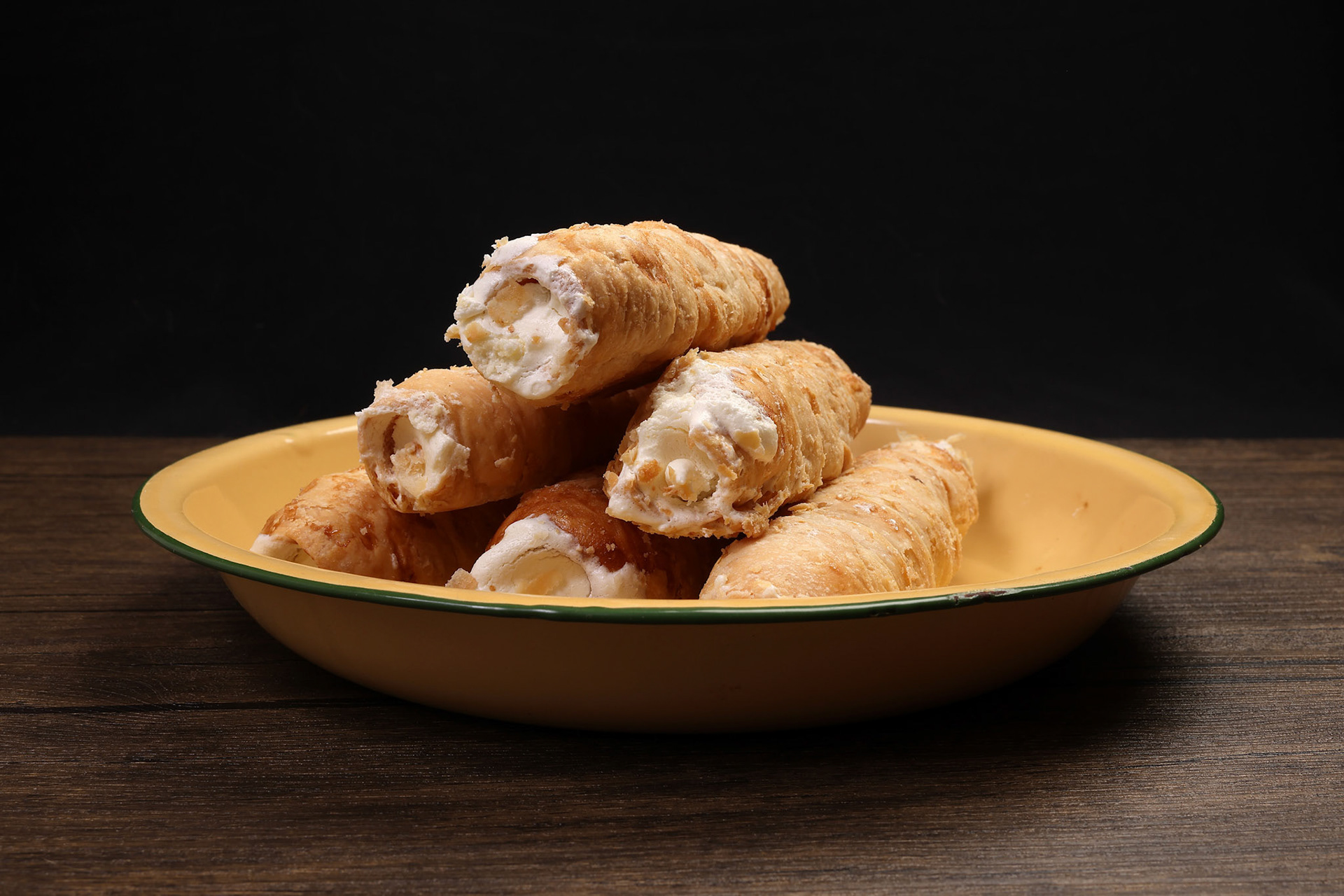 Bangladesh Indian cone shaped hard flaky puff pastry stuffed cream roll