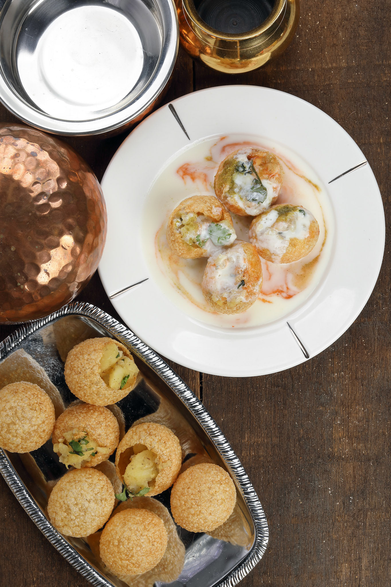 Tadeonal subcontinental street snack food chickpeas potato Dahi Puri Chaat pani puri fuska