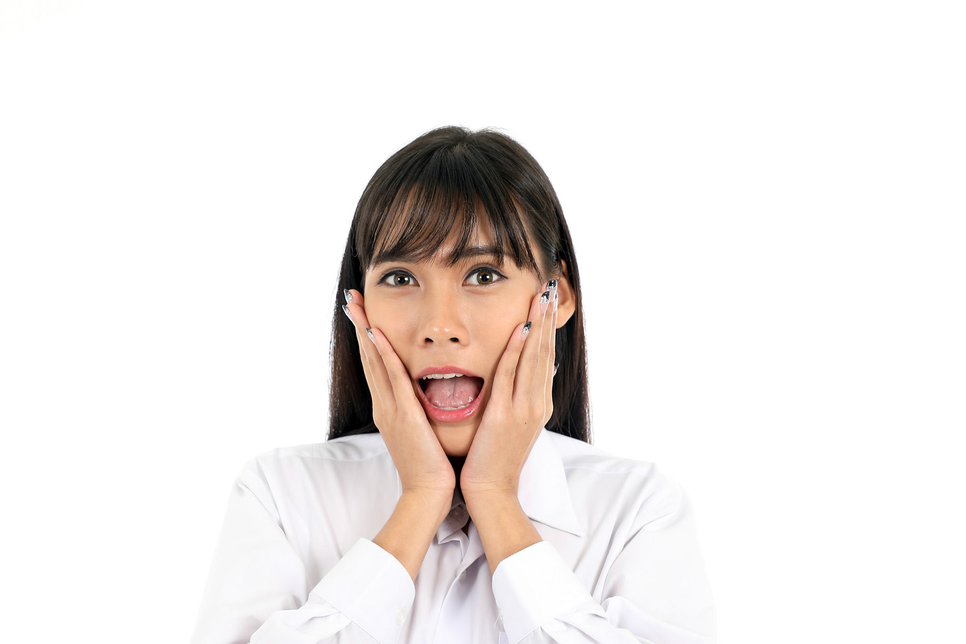 Facial Expression Young Asian woman office attire white background surprised shocked hand on cheek