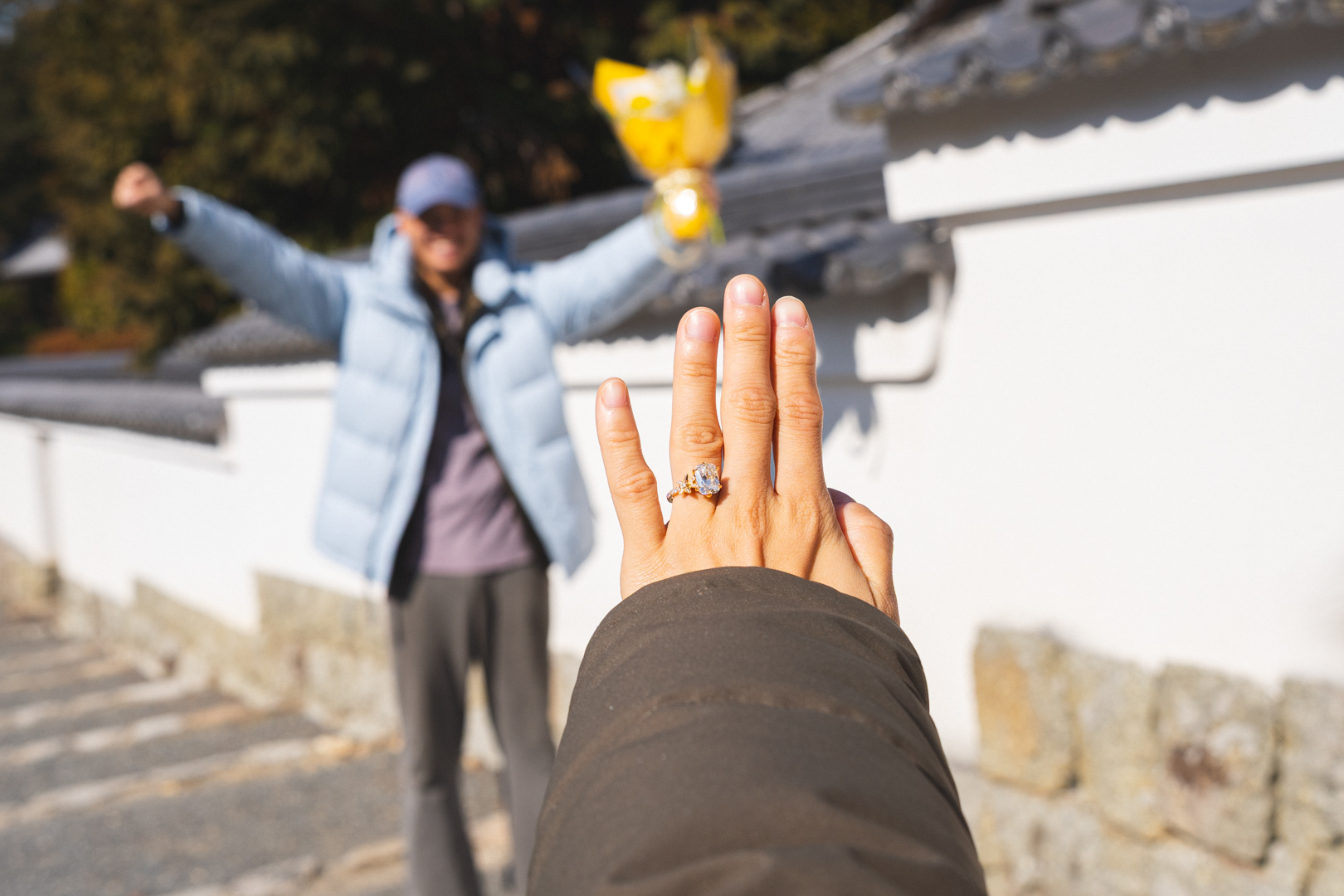 Surprise Proposal Photoshoot Couple Ring and Bouquet Shot by Paren Creates