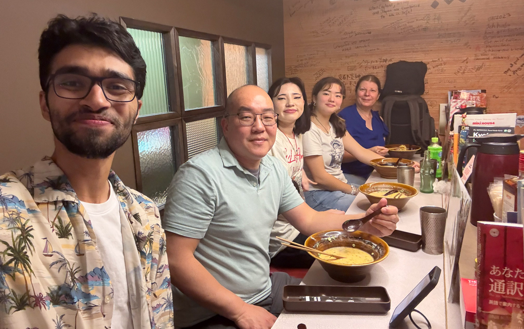 American guests enjoying street food of Osaka during Osaka Day Tour