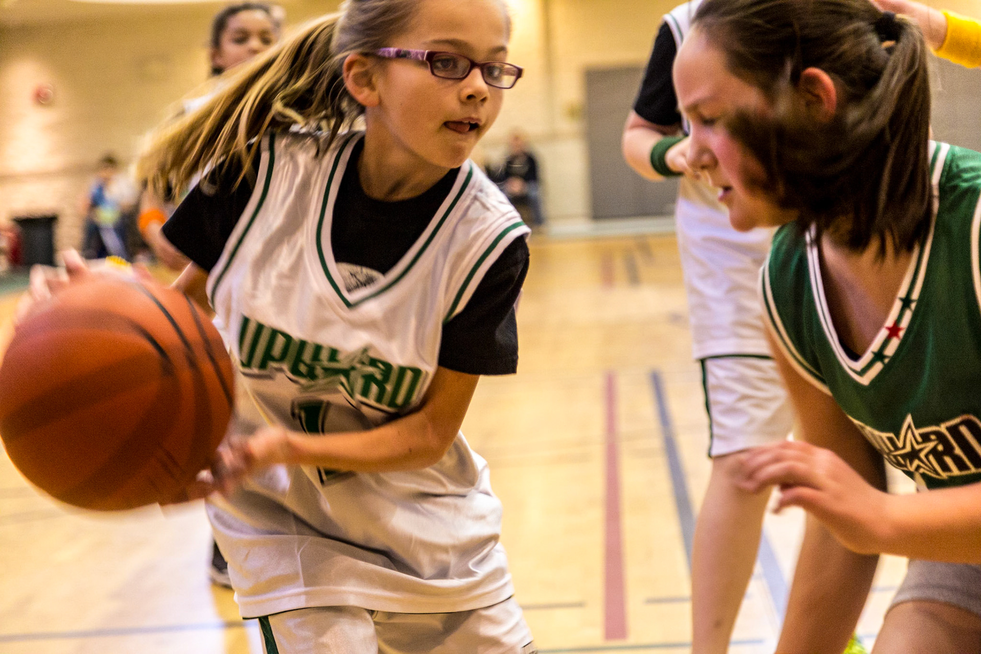 This is the third year a trip to Josephine's birthday party meant watching Trever and Grace, her older siblings, play basketball at Munsey United Methodist Church.  The first time was not really Josephine's birthday.  It was a few days after her birth. So, this trip was at the time she turned 2.  Michael Estes is Grace's coach. Christie and I have known him several years.