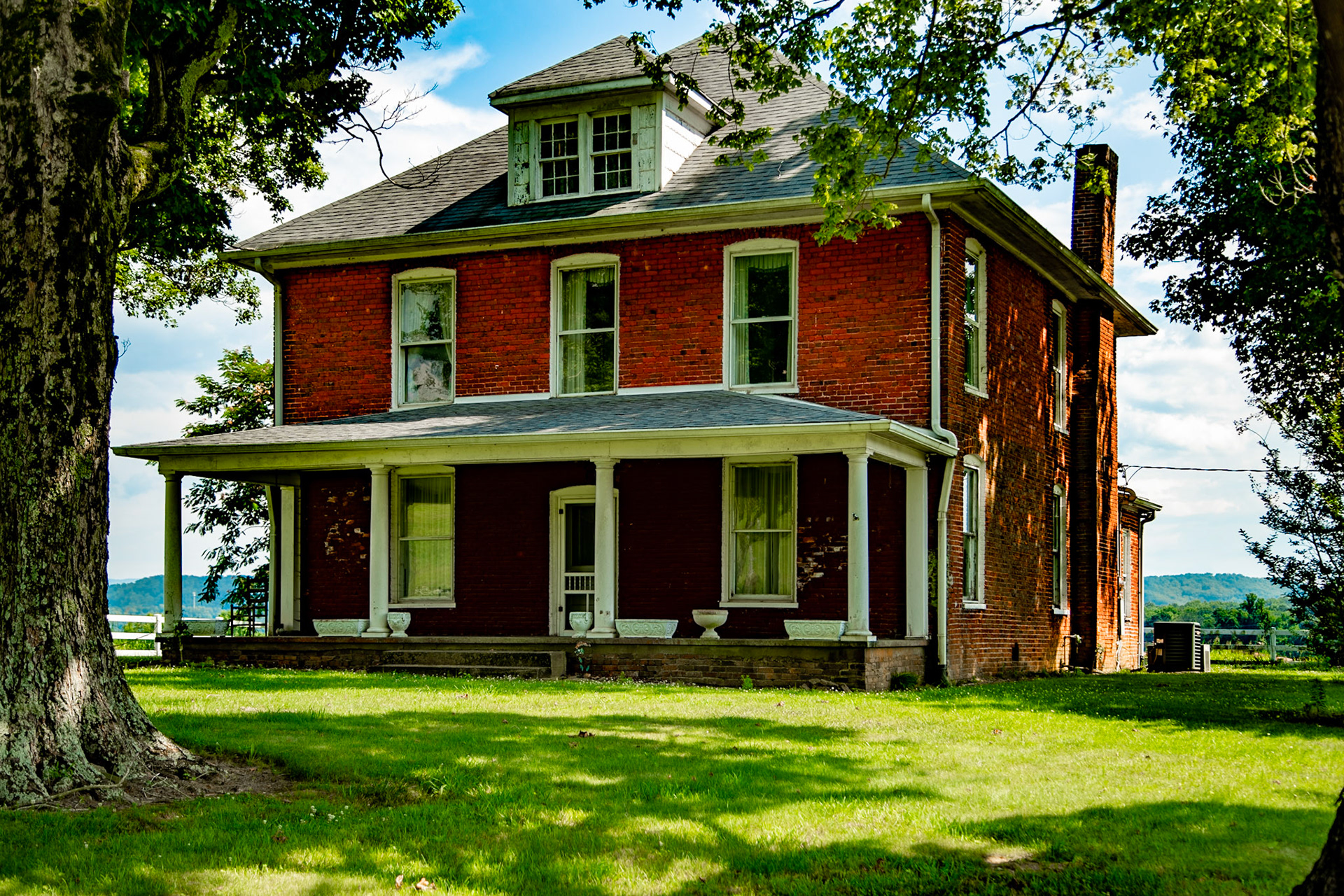 My grandparents moved to this home after TVA acquired their farm on the Clinch River, in Claiborne County, Tennessee.  That was probably around 1934. I was born in 1947, about 18 months before my grandfather died, and visited this farm until sometime after my grandmother died around 1959.