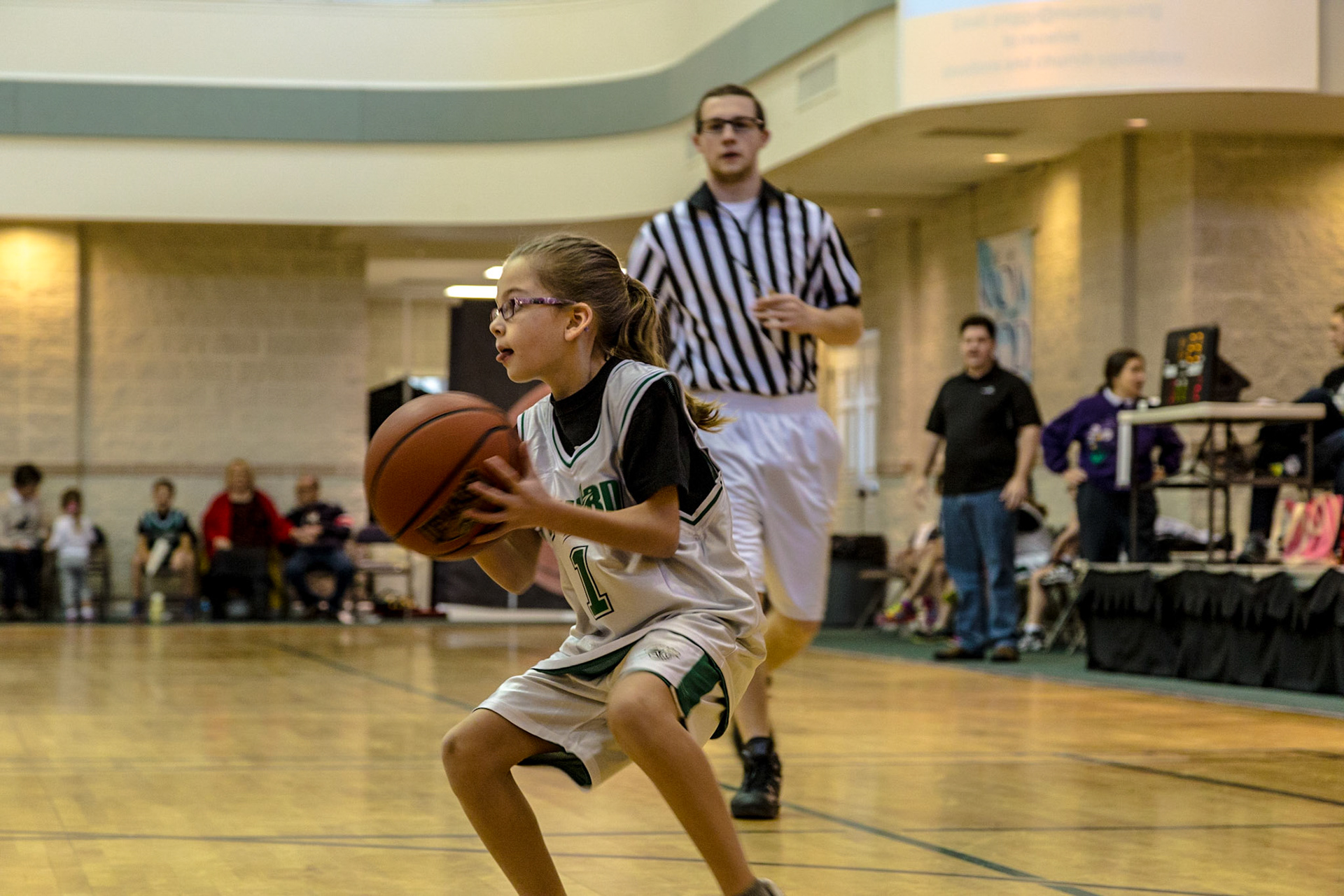 This is the third year a trip to Josephine's birthday party meant watching Trever and Grace, her older siblings, play basketball at Munsey United Methodist Church.  The first time was not really Josephine's birthday.  It was a few days after her birth. So, this trip was at the time she turned 2.  Michael Estes is Grace's coach. Christie and I have known him several years.