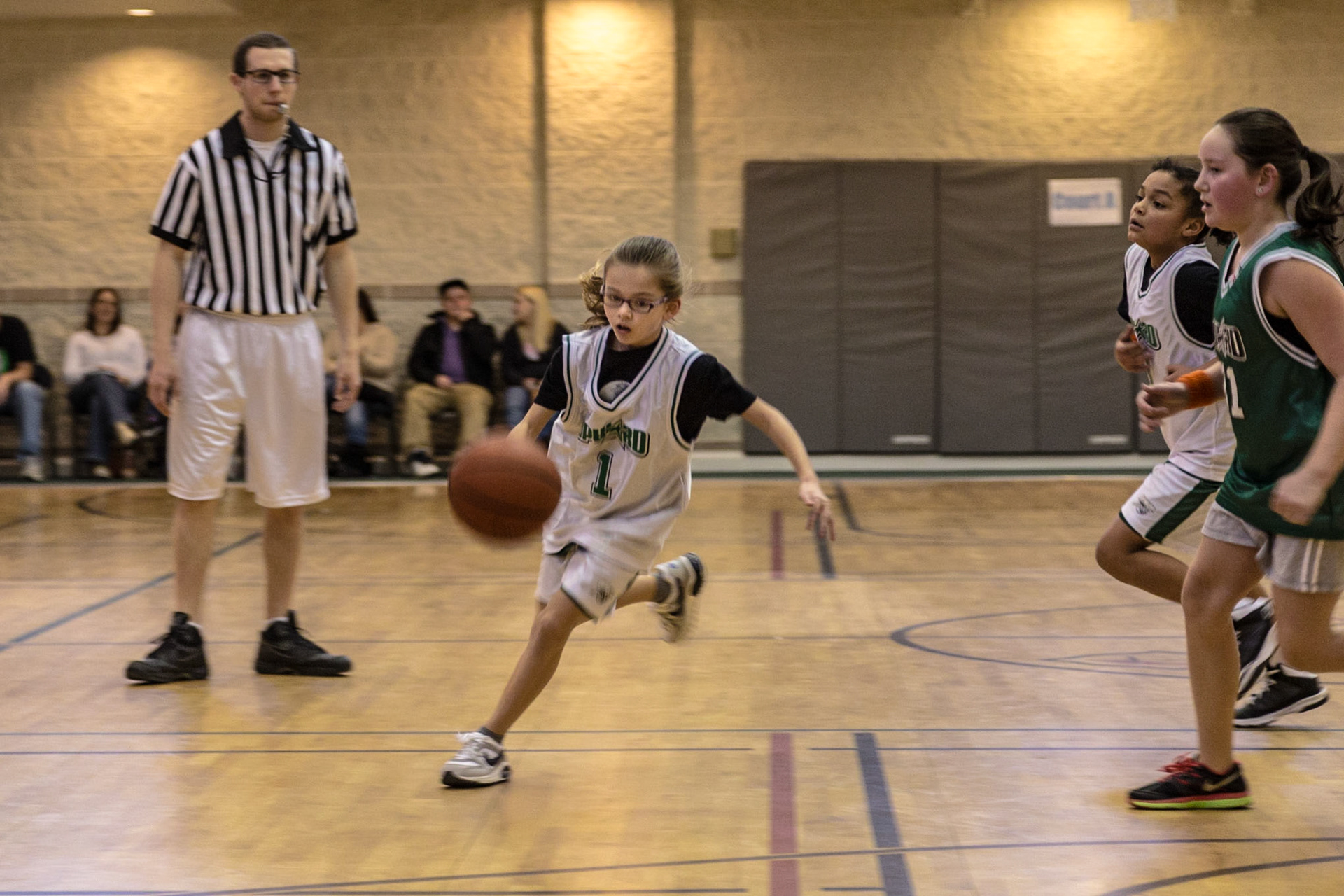 This is the third year a trip to Josephine's birthday party meant watching Trever and Grace, her older siblings, play basketball at Munsey United Methodist Church.  The first time was not really Josephine's birthday.  It was a few days after her birth. So, this trip was at the time she turned 2.  Michael Estes is Grace's coach. Christie and I have known him several years.