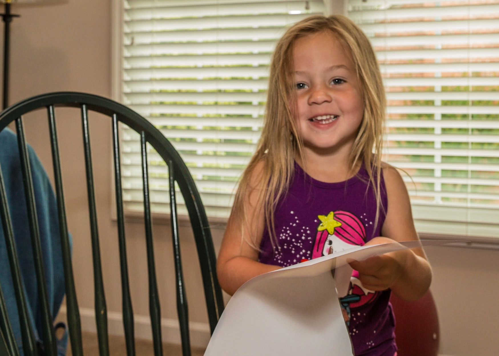 Sophia cut out paper kites while Raven and Grammy worked with the sewing machine.