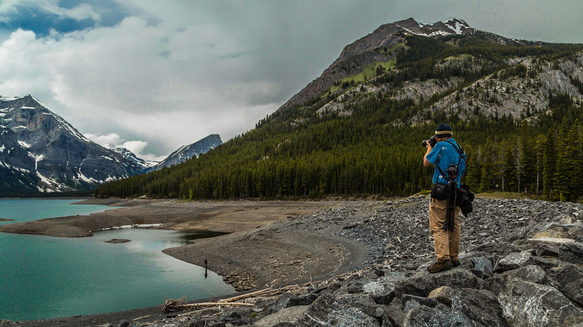 Exploring west of Highway 40 for a good while, making more or less random turns on dirt roads, we came to a manmade damn and lake. This water level was low, although several lakes we passed were more or less full. This one got enough of our attention to roam around the area for a good long while.  Maybe the guy fishing on the shore was the key for this stop. Maybe it was a feeling that the road didn’t go much higher into the mountains.  Who know? It was just a good stop.
