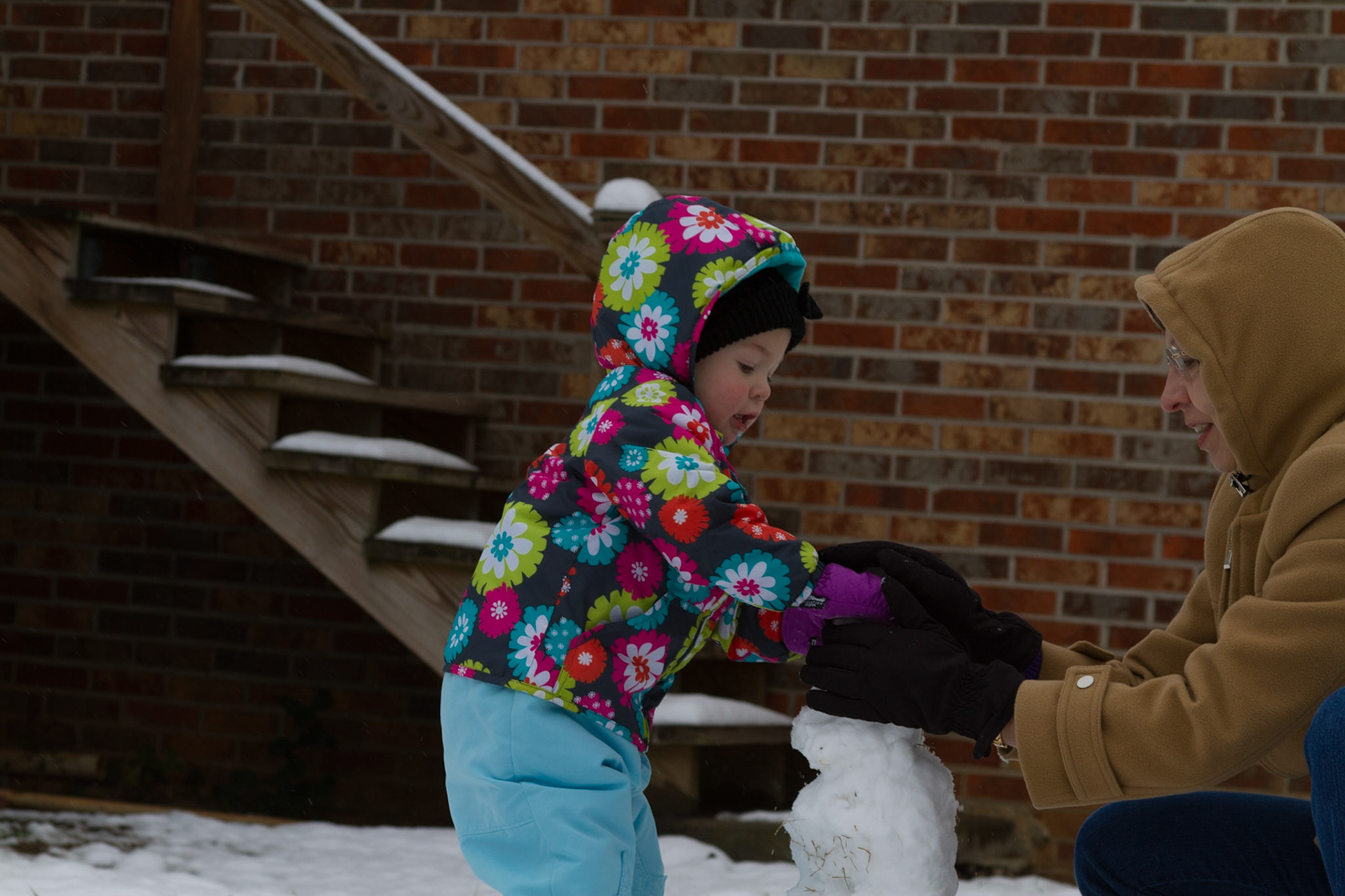 Stopped by for Coit and Danielle's house for quick visit.  They were making a snowman.