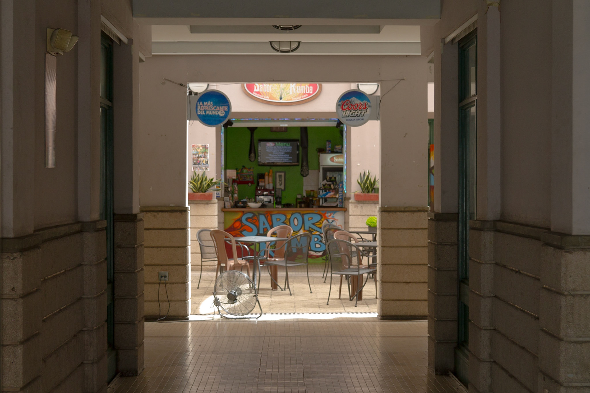 This one was shot from the street through an enternce for a courtyard cafe, surrounded by shops.  Above the shops was a hotel, which appeared to be impressive, built in 1920.