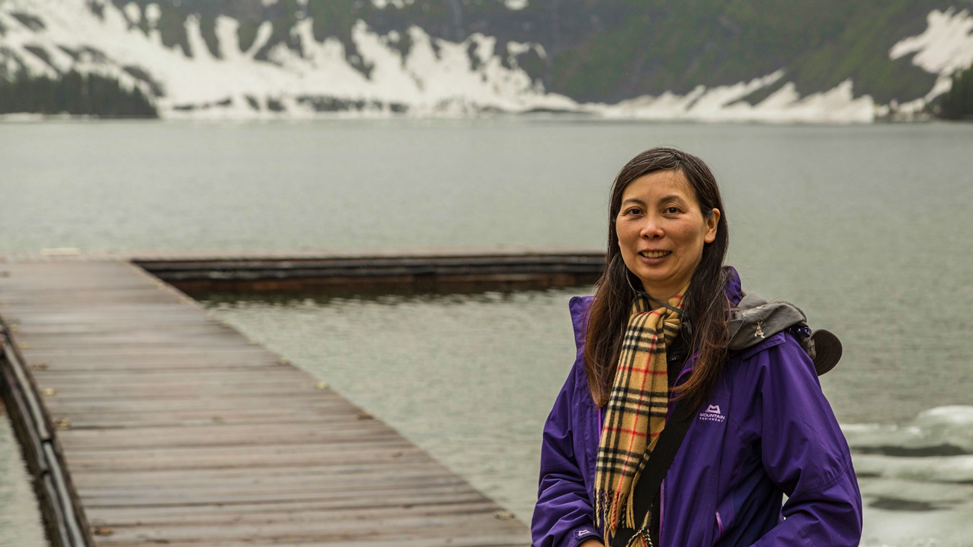 When we arrived at Cameron Lake, there was a friendly family from Hong Kong, who asked us if we had seen the bear. It looked like older parents and three daughters about the age of this woman. They were excited about the bear and Canada. When we were looking around, they were taking pictures of each other, with the dock, lake and mountains. I asked if I could take this one. She agreed. Later, I gave them my email address. As of July 6, I have not received a message.