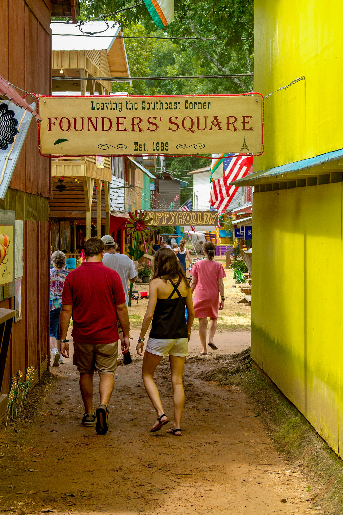 The walk into the Neshoba County Fair Grounds, through the craft market day, to the Smith - Hill - Nance Fair HouseSecond Day, Neshoba County Fair