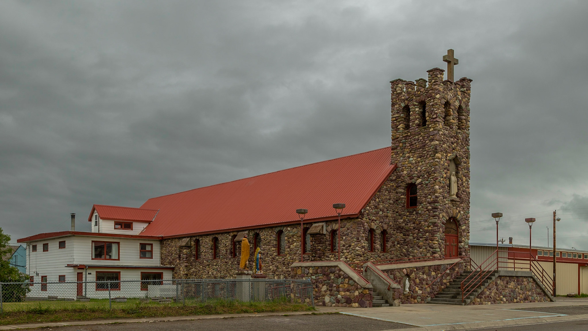 So, I wanted to drive out of the mountains onto the prairie to an open expanse of Montana.  Instead of the shorter route from East Glacier to St. Mary, we passed a couple of pretty nice looking diners, for lunch in Browning.  The town wasn’t as inviting as I remembered from the buffalo burgers we had there in 2001.  On a street off the highway, to see a neighborhood, we came across Little Flower Parish Church.  Lunch was at a large casino.  I now think we could have done better in one of the diner near East Glacier and the shorter route to St. Mary.