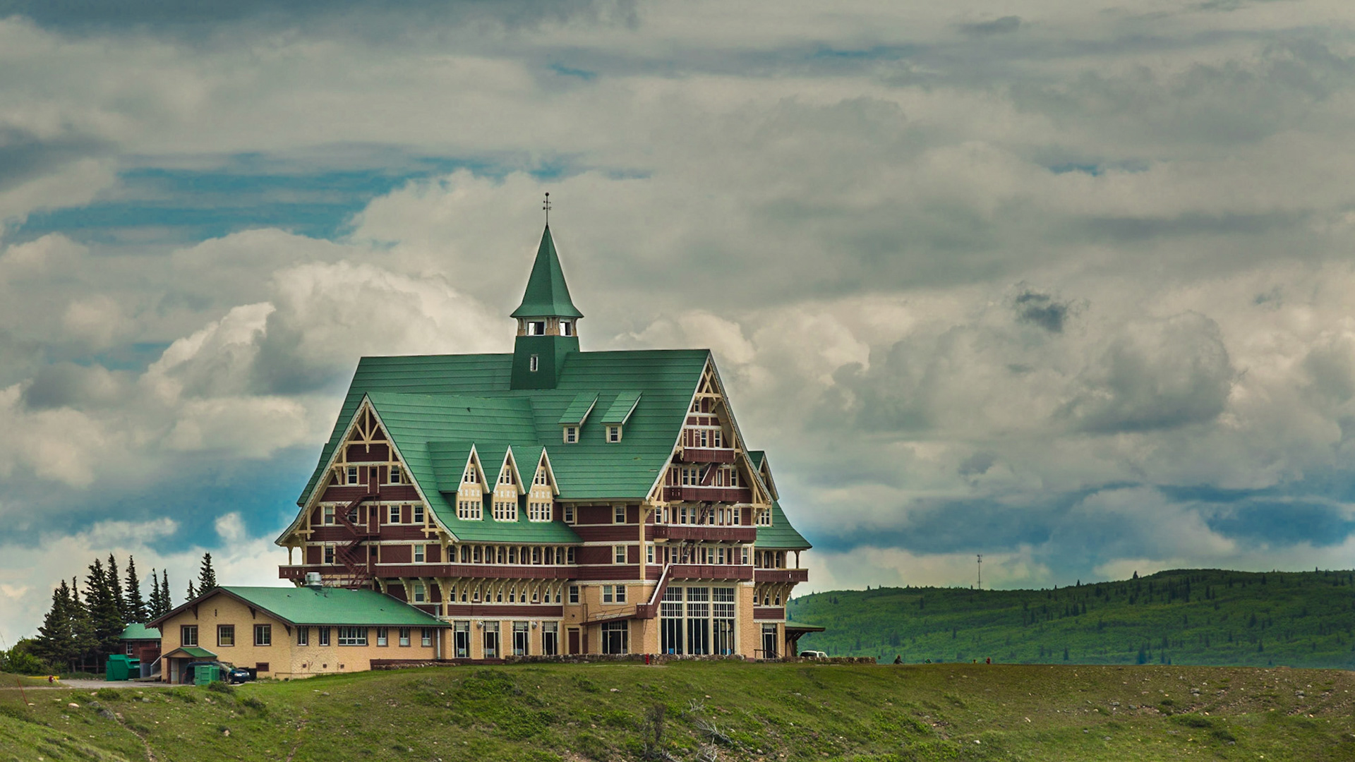 Before breakfast on the morning of this image, I walked the streets of “downtown” Waterton, AB, trying to find a perspective I liked for the Prince of Wales Hotel.  It was disappointing.  Later, coming back into town from Cameron Lake, we rounded a curve that put us essentially at the same elevation as the hotel. Granted, it may have been better if I was there with sunset light on this west face, but you take what you can get.
