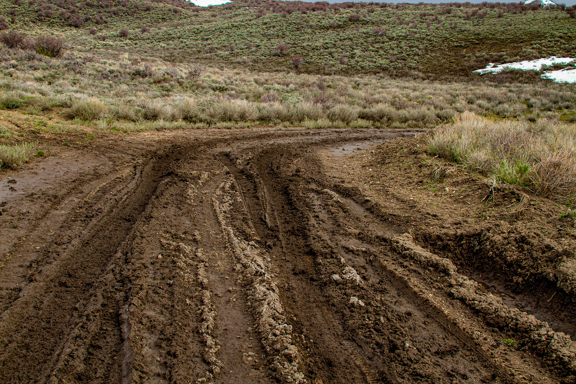 Hamilton Nevada, Second Try, May 21, 2011 - Leaving Belmont, I took the right turn that appeared to be another chance to see Hamilton.  The road was good, until I came to some minor mud on a down-sloping curve that went out of sight.  I stopped and decided the mud didn't look serious.  Around the mud got really deep.  I got through it only to be confronted by another large snow drift.