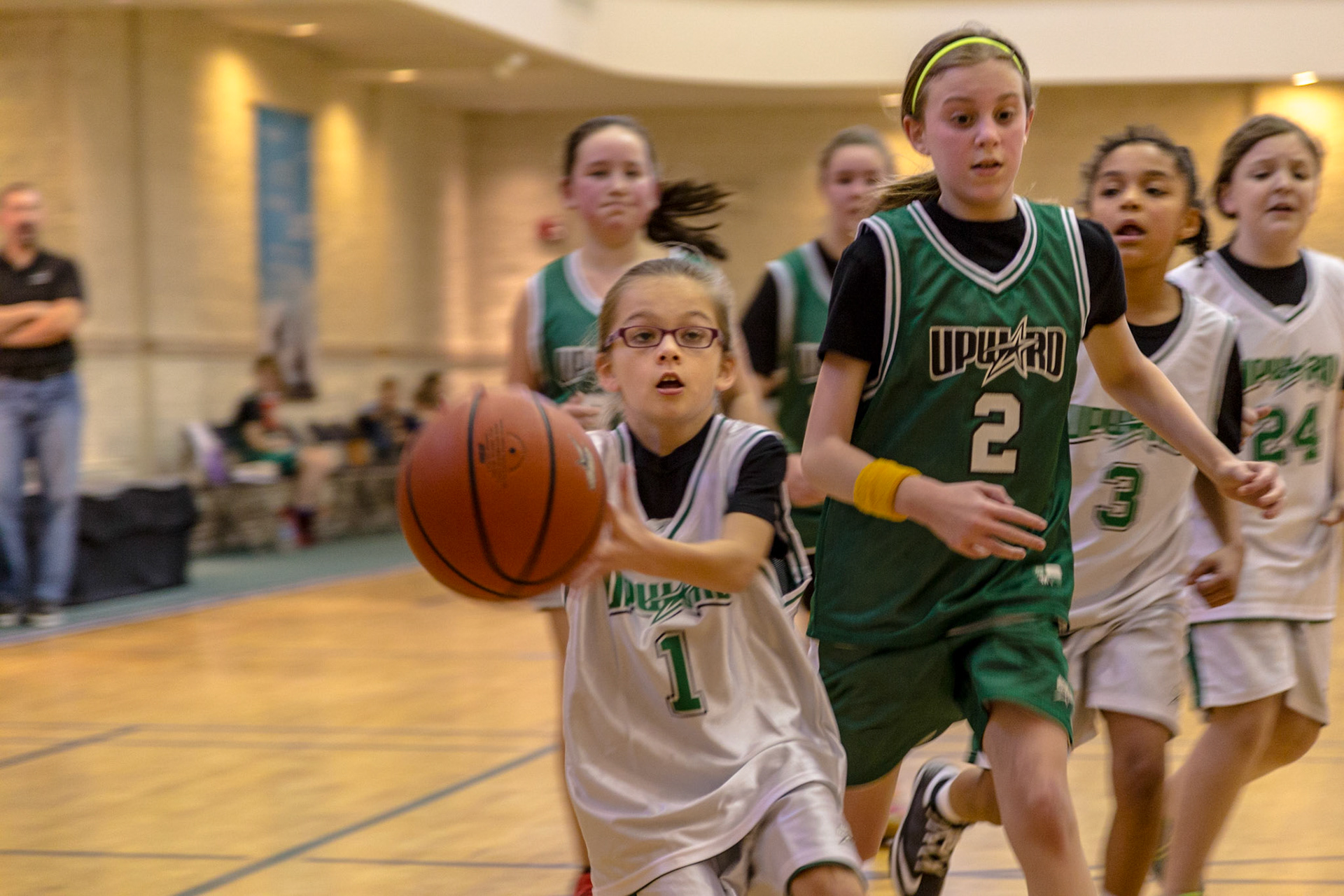 This is the third year a trip to Josephine's birthday party meant watching Trever and Grace, her older siblings, play basketball at Munsey United Methodist Church.  The first time was not really Josephine's birthday.  It was a few days after her birth. So, this trip was at the time she turned 2.  Michael Estes is Grace's coach. Christie and I have known him several years.