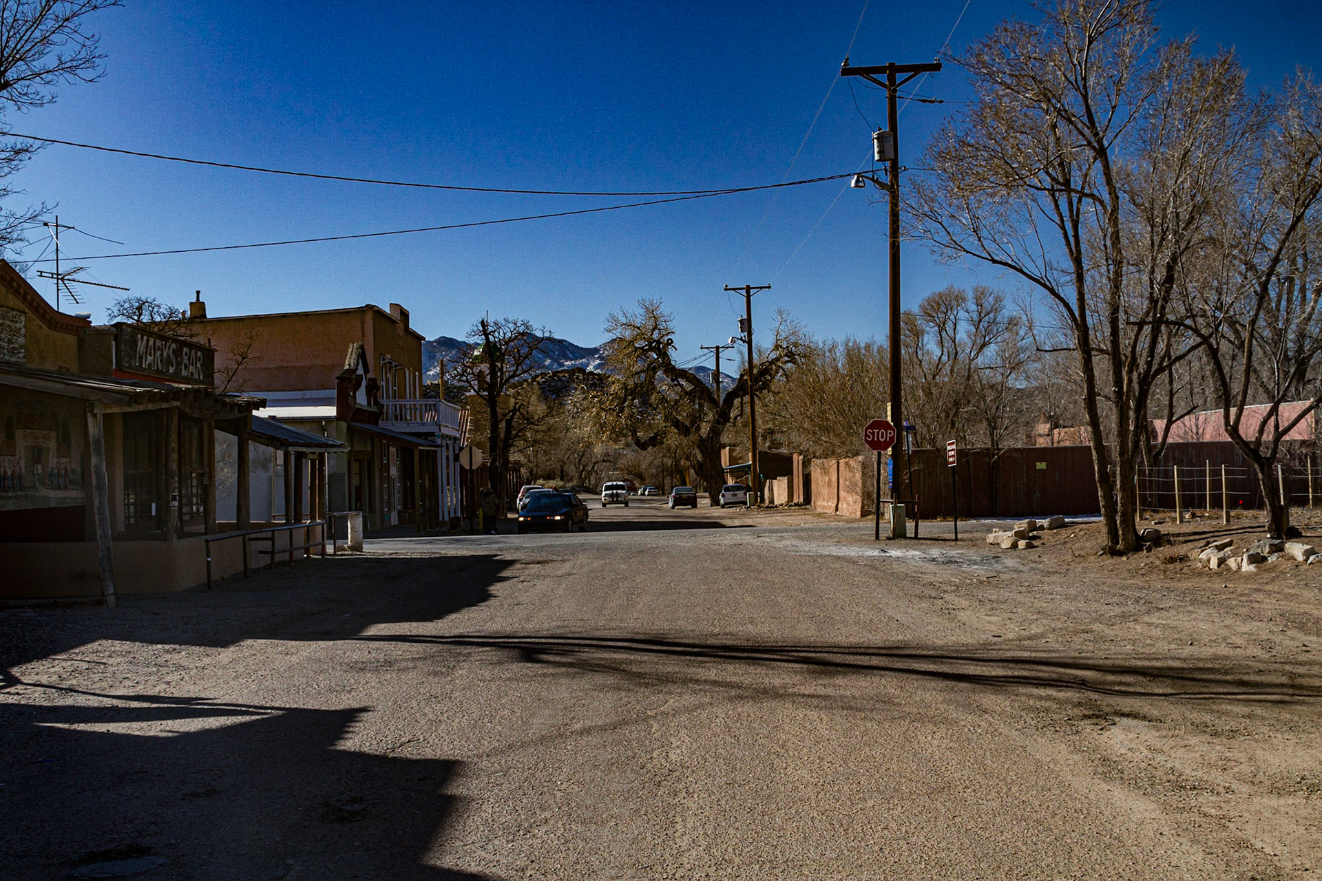 On Sunday morning, we resolved to have tamales and visit the upscale art shops on Canyon Road.  Before they opened, we had time to explore the beginning of Turquoise Trail.  Los Cerrillos was an interesting, almost deserted, town.  A railroad passed between the town and Cerrillos Hills State Park.  A short walk to an overlook in the park gave us another perspective on the town, including a short history of the town on a plaque.  As we left we listened to Jimmy Buffett’s song Ringlin, Ringlin, which describes a very similar town.
