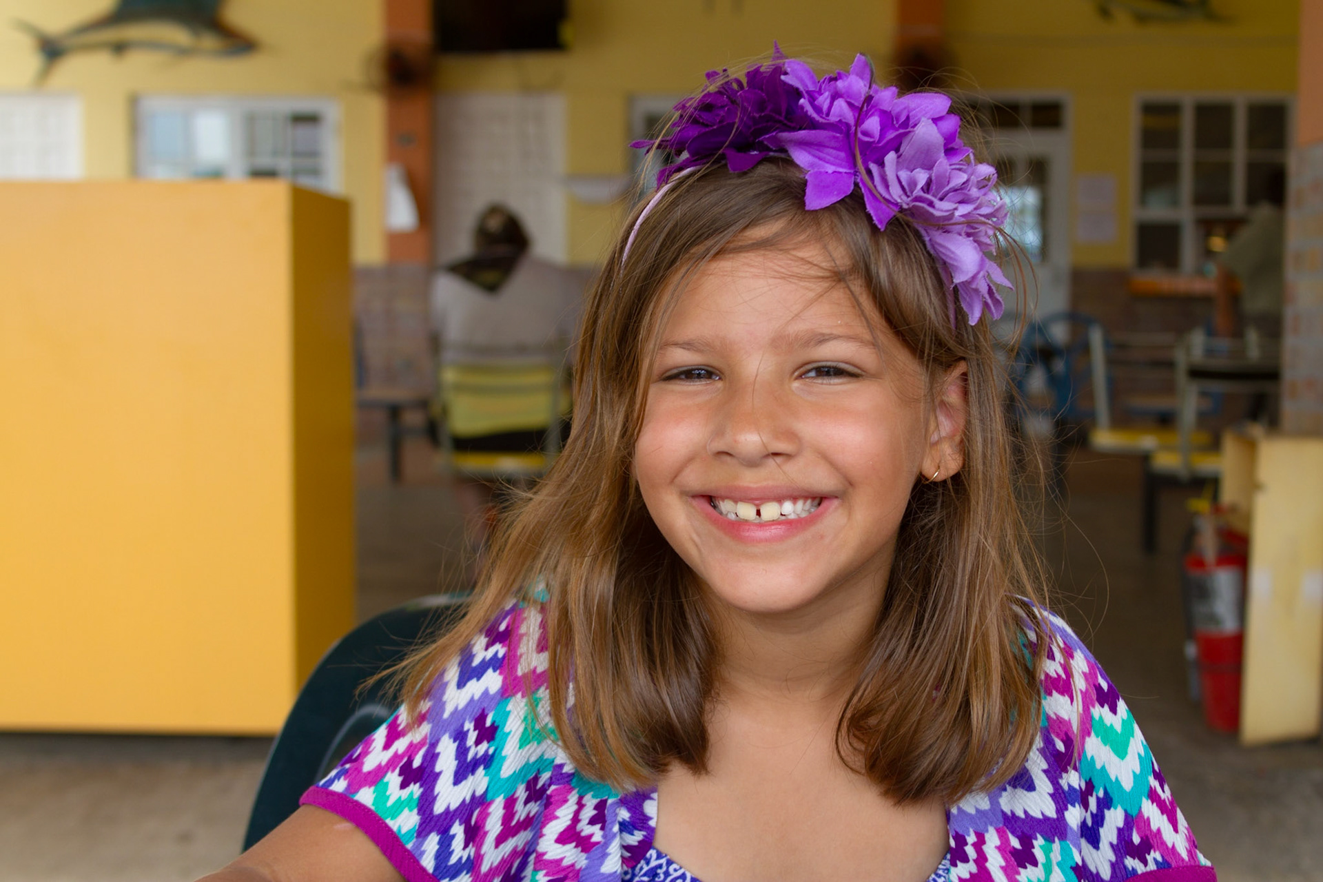 Of course, we had to spend a little time at the marina and boardwalk for Playa Ponce.  Lunch was a good reason to go there. The women with the red snapper also gave permission for me to get this picture of the young lady with them.