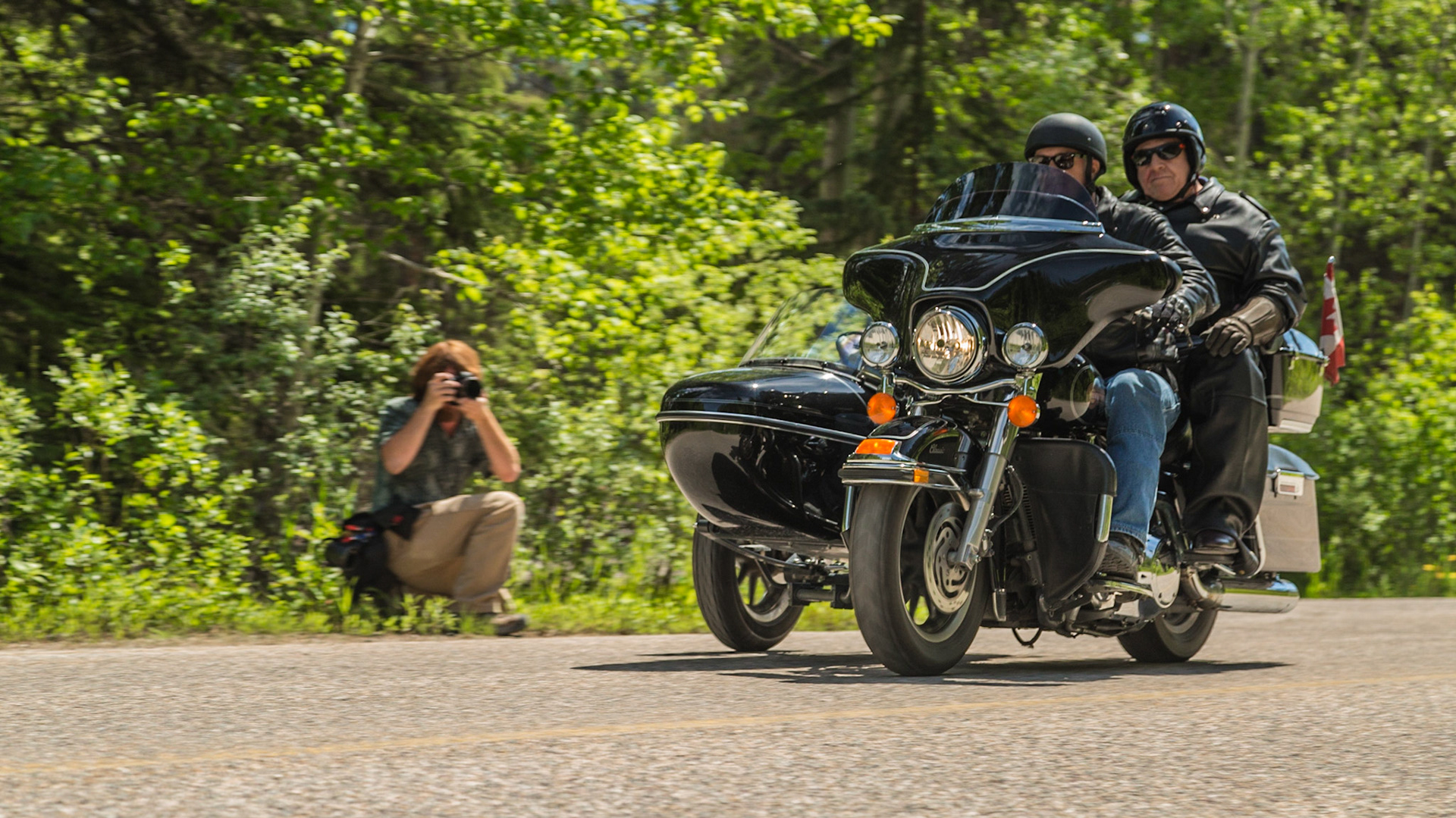 After a day that was mostly getting the flat tire replaced, a pub lunch and our hurried trip north on Icefield Parkway (June 17), we were ready to head south on the route that inspired Jasper, Alberta for this Father’s Day adventure. Highway 93 runs from Jasper to the Mexican border, through a vast array of landscapes. This year, we made it from Jasper to Kalispell. In 2015, we currently expect another lag of the trip. At the rate we travel, it may take three to four years to see all of Highway 93, if we actually make it. Until this point, the 2014 trip was an interesting way to reach our starting point.  The reasons have to do with airline schedules and my interest in seeing this route to Jasper.We began southbound on Icefield Parkway, with time for stops. Soon, we took a turn for a closer view of the Athabasca River, where we met five or six motorcycles with sidecars. Our reaction was wishing for a chance to shoot pictures. When this road turned away from the river we returned to a picnic area on the river. The motorcycles were there. It turns out they were not some kind of club, as we imagined. They were a Jasper tourist attraction. Guys in their 40s or 50s drove, carrying two tourists each – aging couples in this case. They were resting, before their return to Jasper on the road that might have been the “old highway” into Jasper.  We talked long enough to get a sense for their “mission.” That ride was probably expensive. When they were climbing into and onto the machines, we headed to setup for their departure. We got our chance for the shots we wanted earlier.